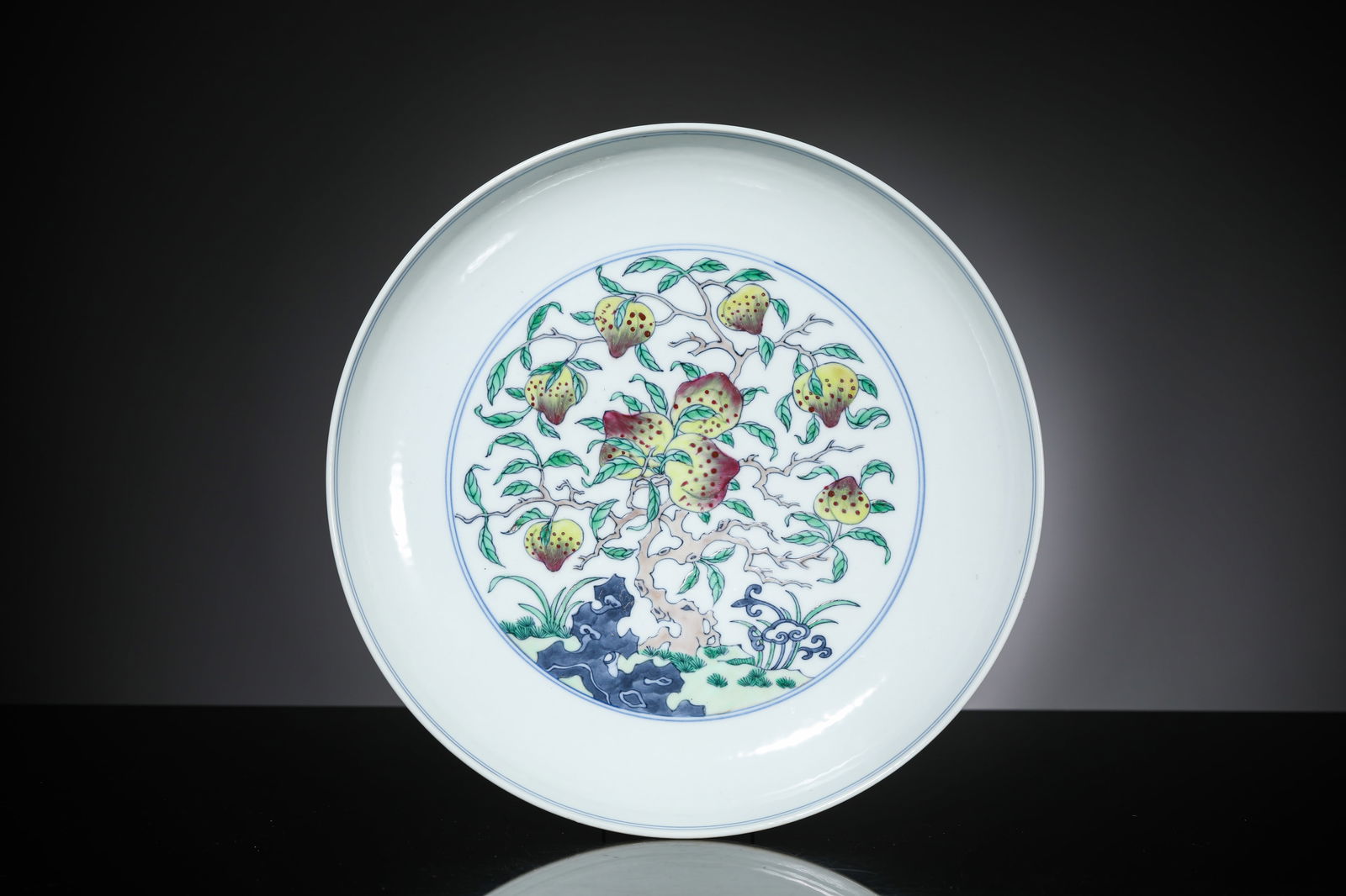 A Doucai 'Bat and Shou' Dish: A Doucai 'Bat and Shou' Dish (22.2 x 4.3cm)