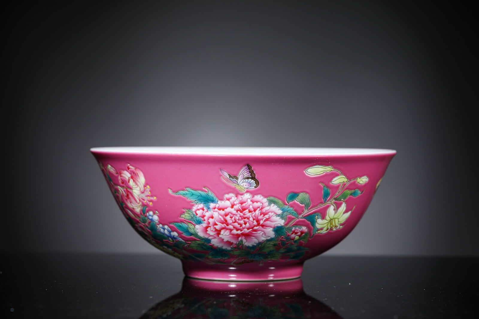 A Rouge-Ground Famille-Rose 'Butterflies Among Flowers and Poem' Bowl: A Rouge-Ground Famille-Rose 'Butterflies Among Flowers and Poem' Bowl (15 x 6.3cm)