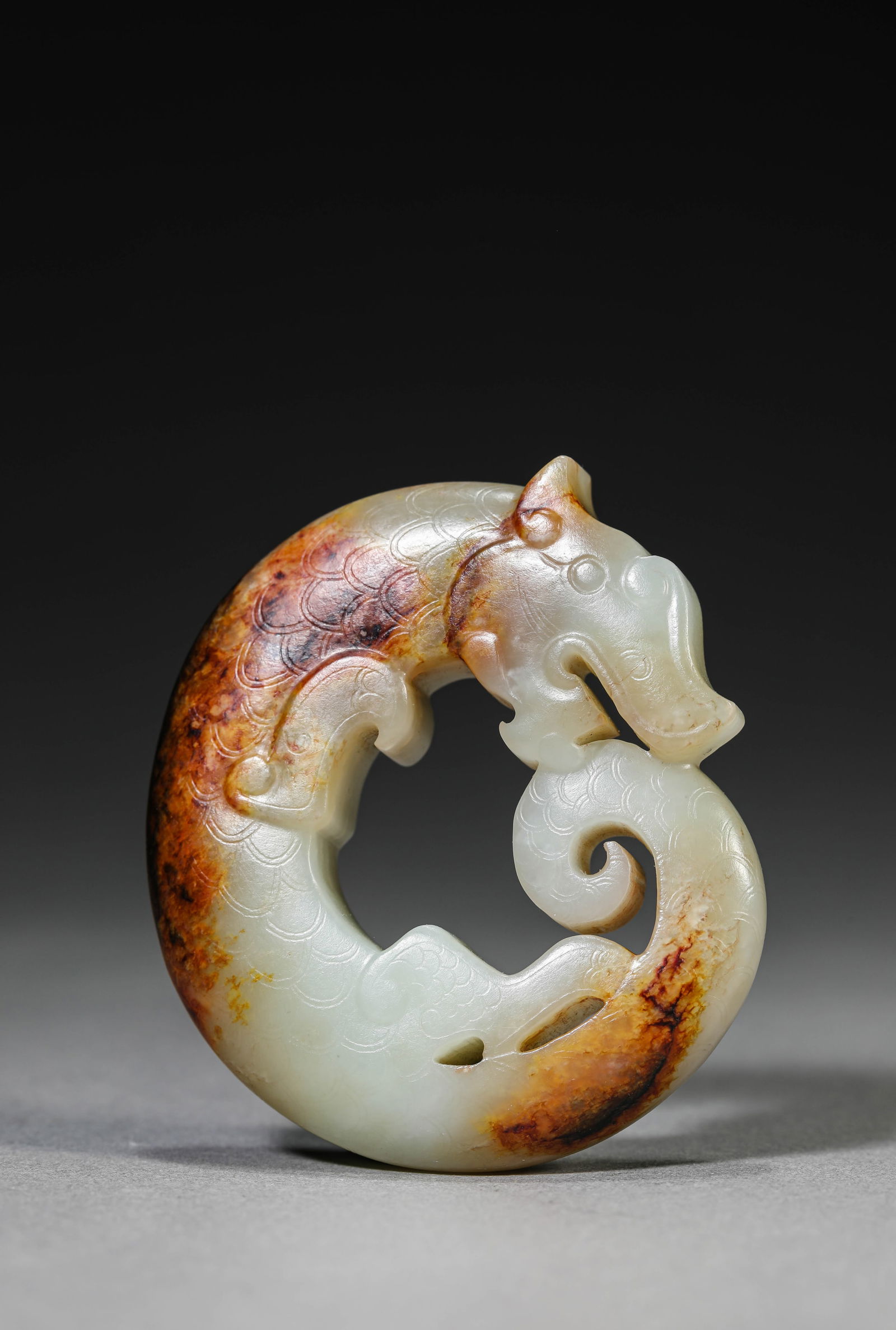 A Jade Dragon: A Jade Dragon (5.8 x 1.3 x 6.5cm)