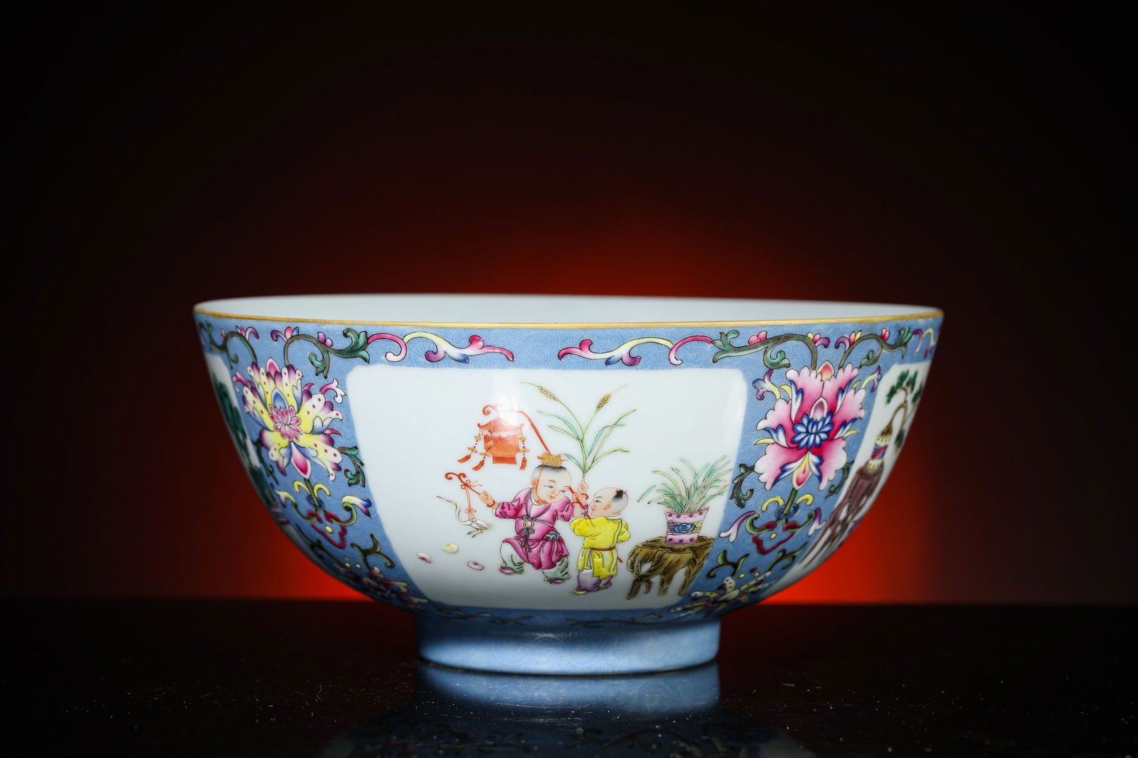 A Blue-Ground Famille-Rose 'Children at Play Reserves' Bowl: A Blue-Ground Famille-Rose 'Children at Play Reserves' Bowl (18.8 x 9.1cm)