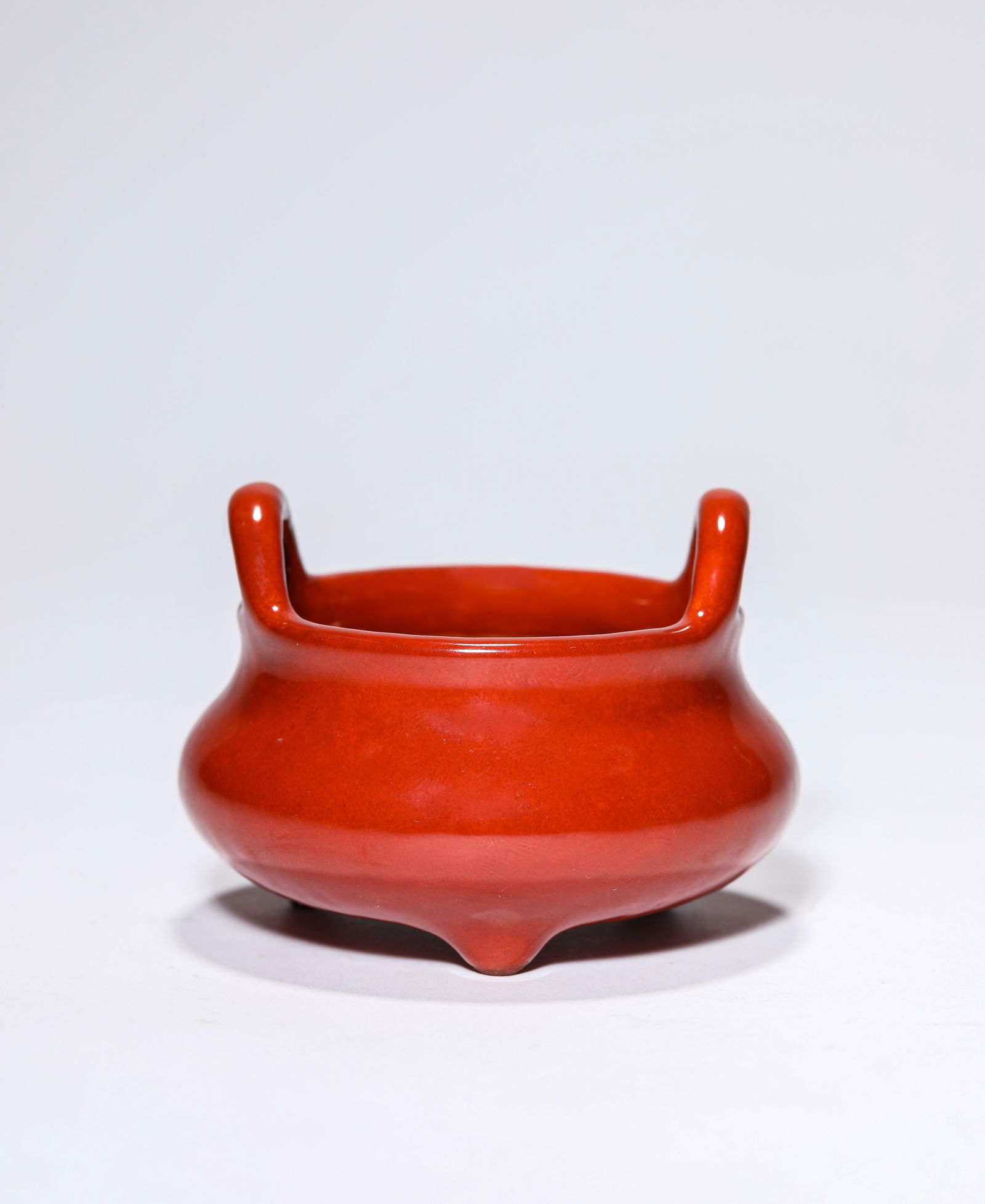 A Red-Glazed Tripod Censer: A Red-Glazed Tripod Censer (7.7 x 5.7cm)