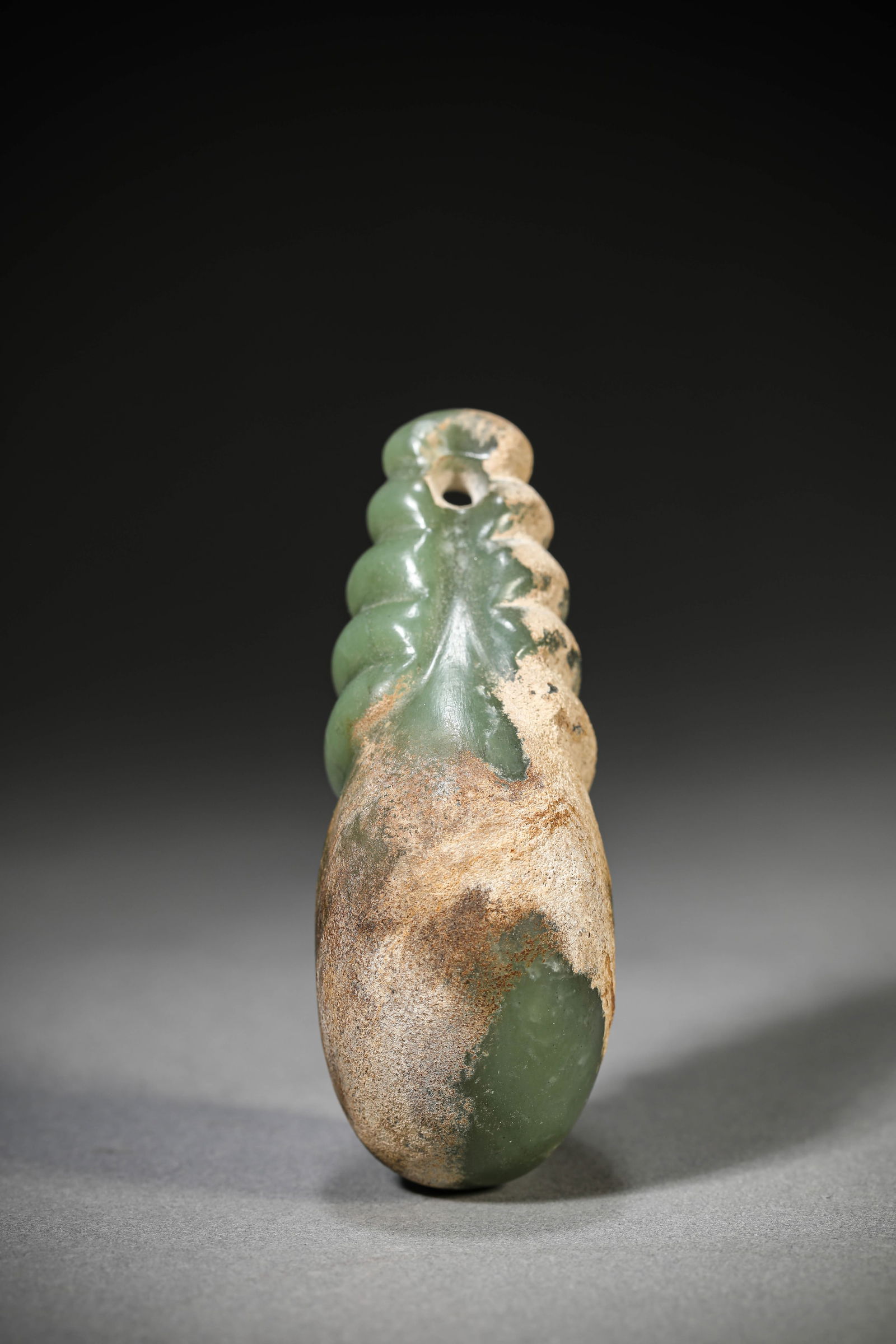 A Jade Cicada: A Jade Cicada (8.6 x 3.2 x 3.4cm)