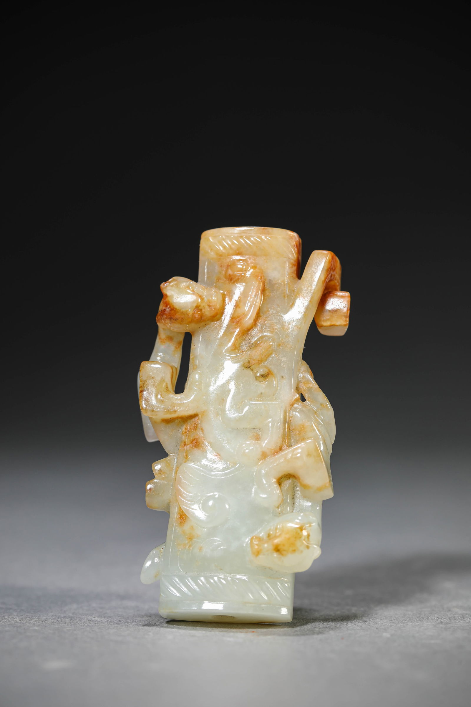 A Jade ‘Chi-Dragon’ Pendant: A Jade ‘Chi-Dragon’ Pendant (3.3 x 1.4 x 6.4cm)