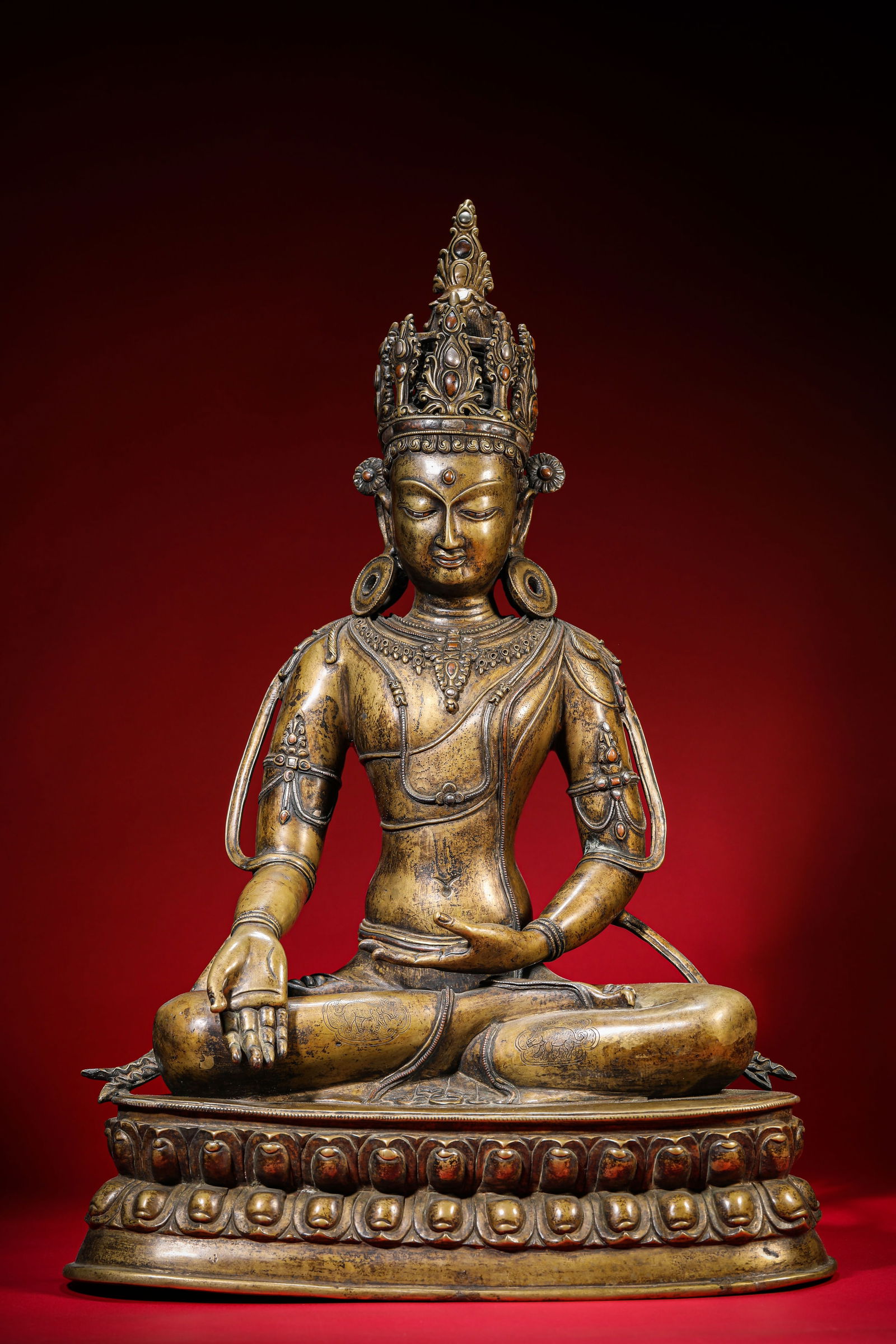 A ‘Ladakh-Style’ Alloy Bronze and Silver-Inlaid Figure of Ratnasambhava (1 of 8)