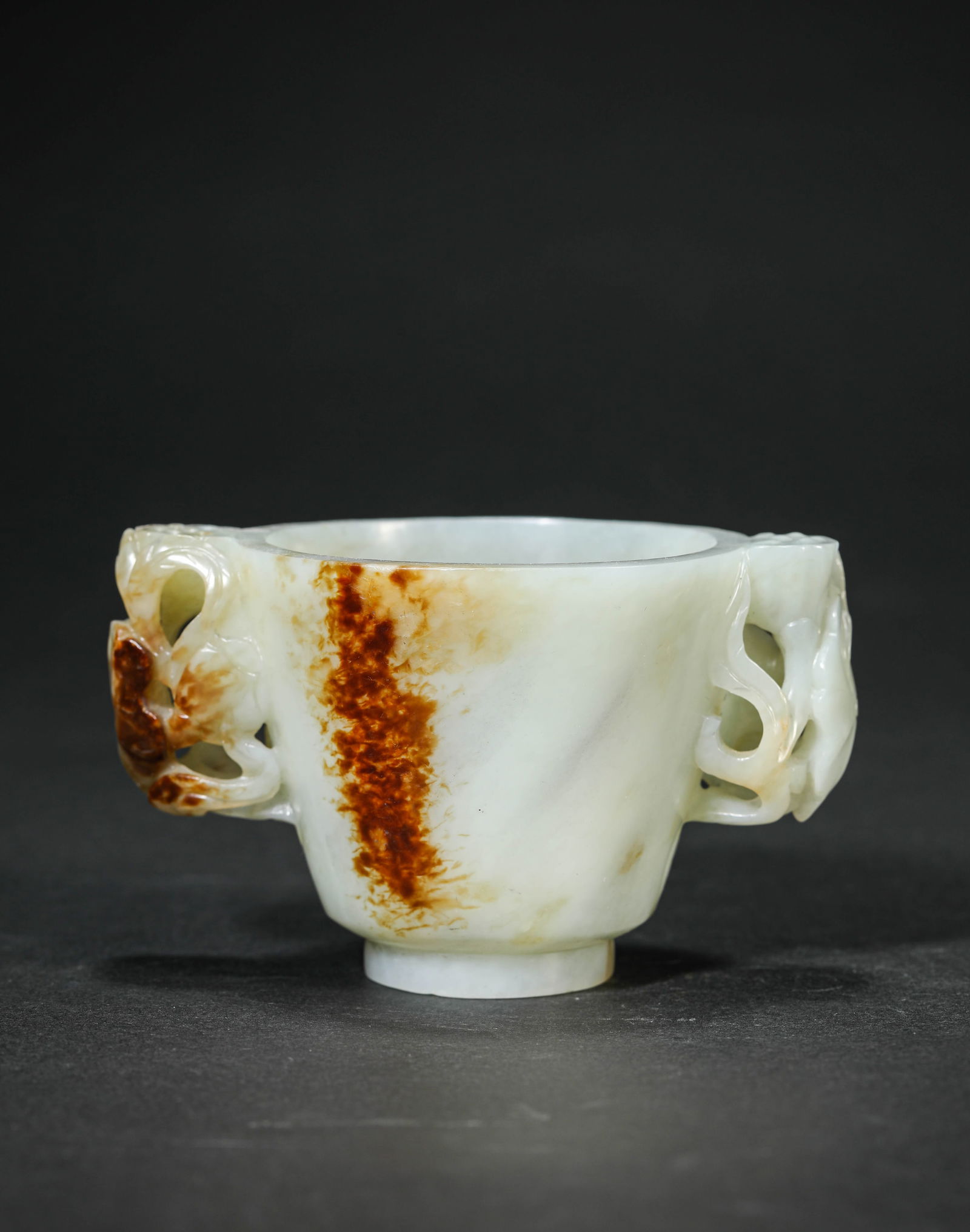 A Jade ‘Lotus Leaf’ Cup with Handles: A Jade ‘Lotus Leaf’ Cup with Handles (10.5 x 7.1 x 6.5cm)