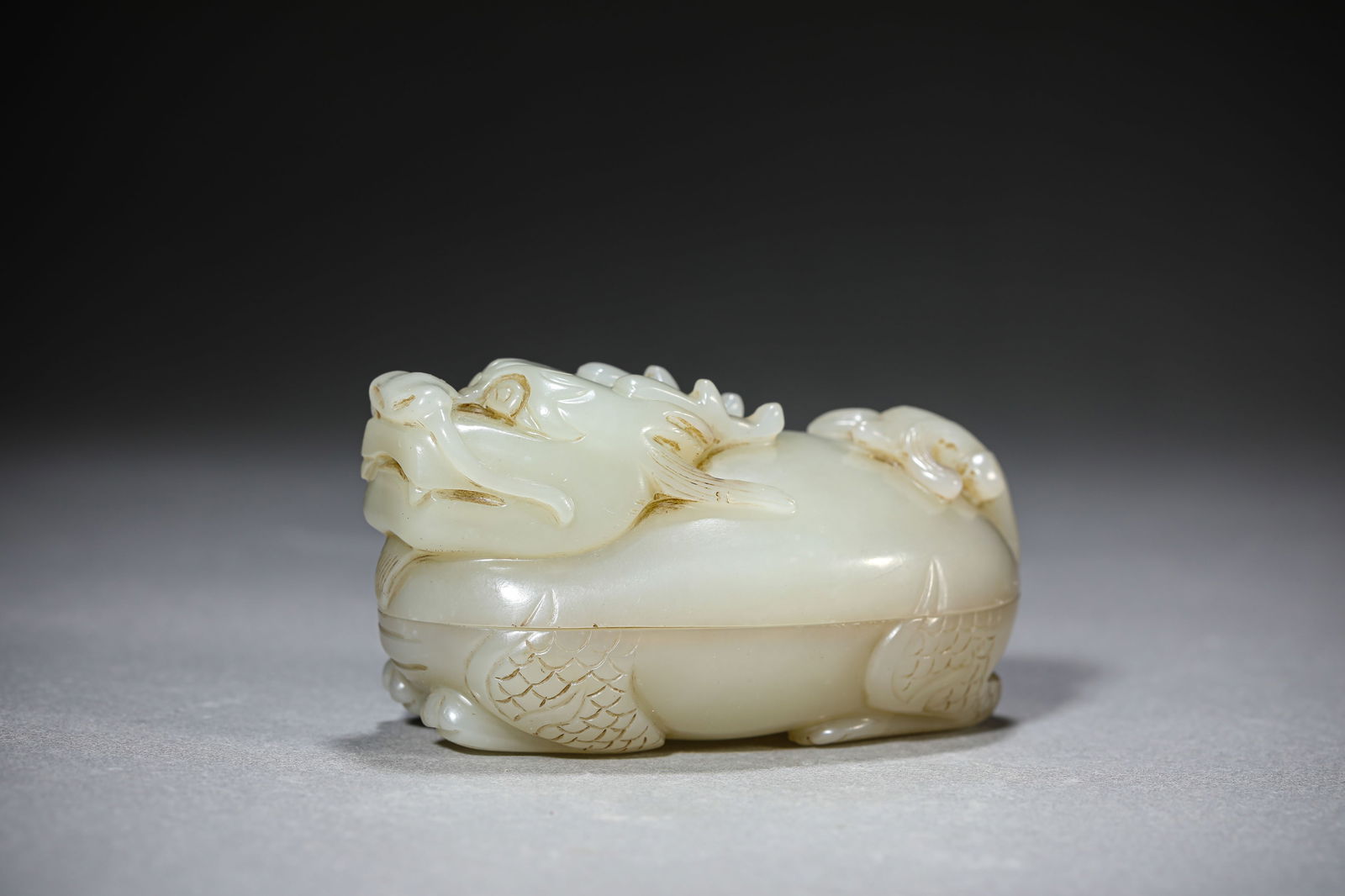 A Jade ‘Kylin’ Covered Box: A Jade ‘Kylin’ Covered Box (8.2 x 4.5 x 4.5cm)