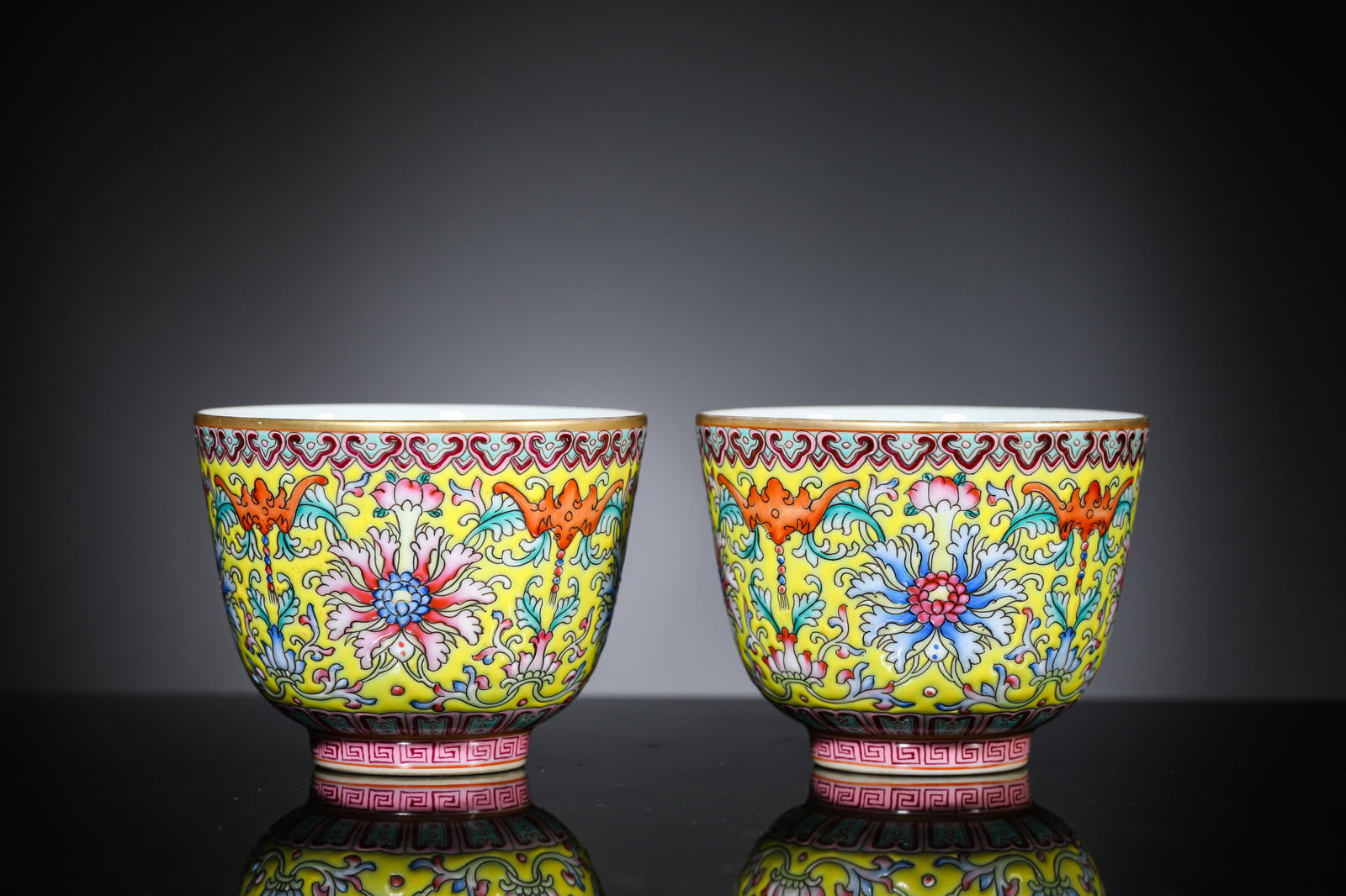 A Pair of Lemon-Yellow-Ground Famille-Rose ‘Interlocking Lotus’ Cups (1 of 4)