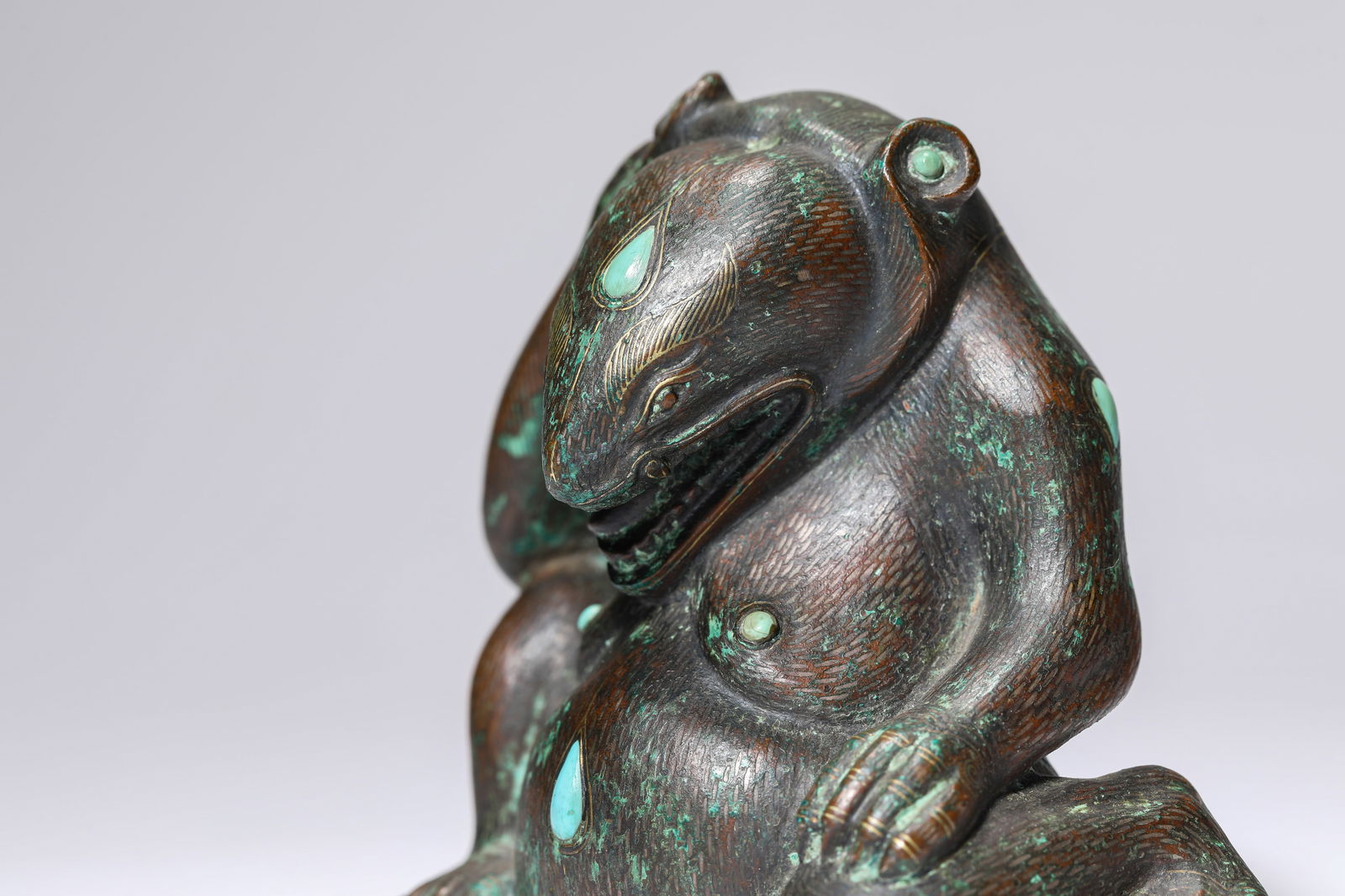 A Turquoise-Inlaid Bronze Bear - 4