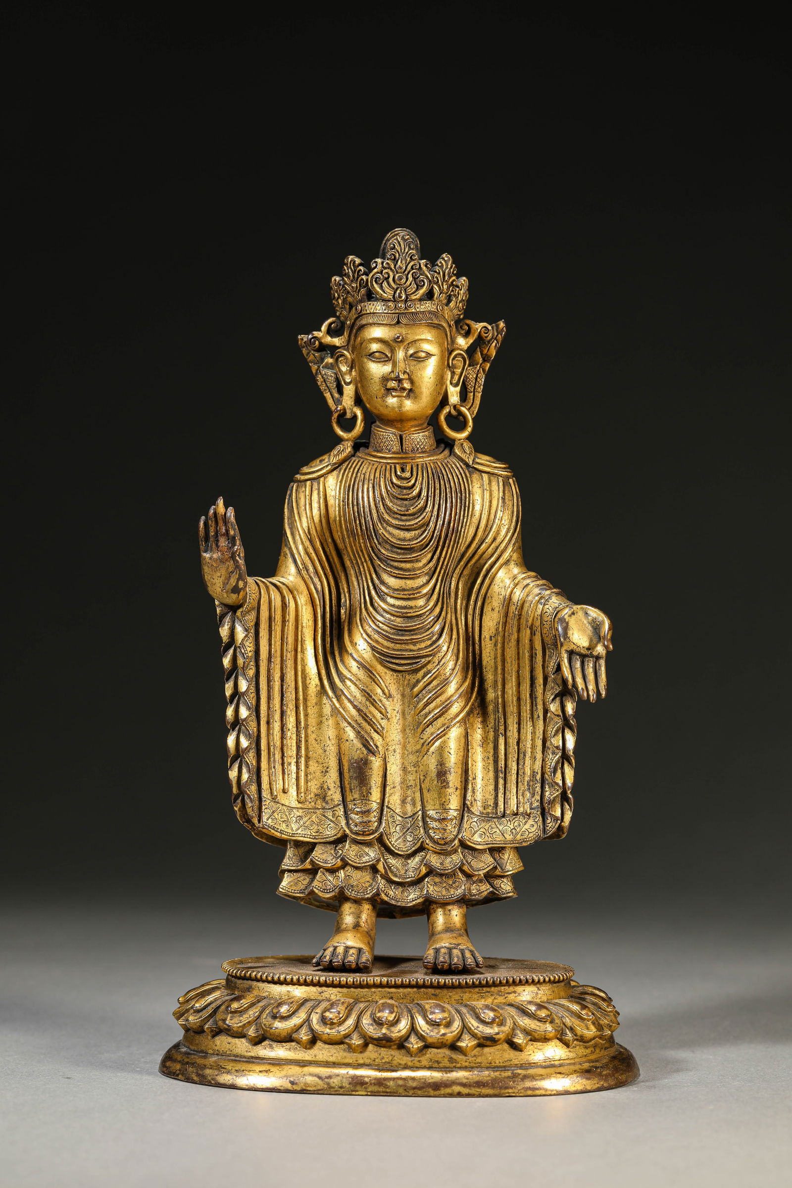 A Gilt-Bronze Figure of the Sandalwood Buddha: A Gilt-Bronze Figure of the Sandalwood Buddha (13 x 8.9 x 23.3cm,Weight 1630g)