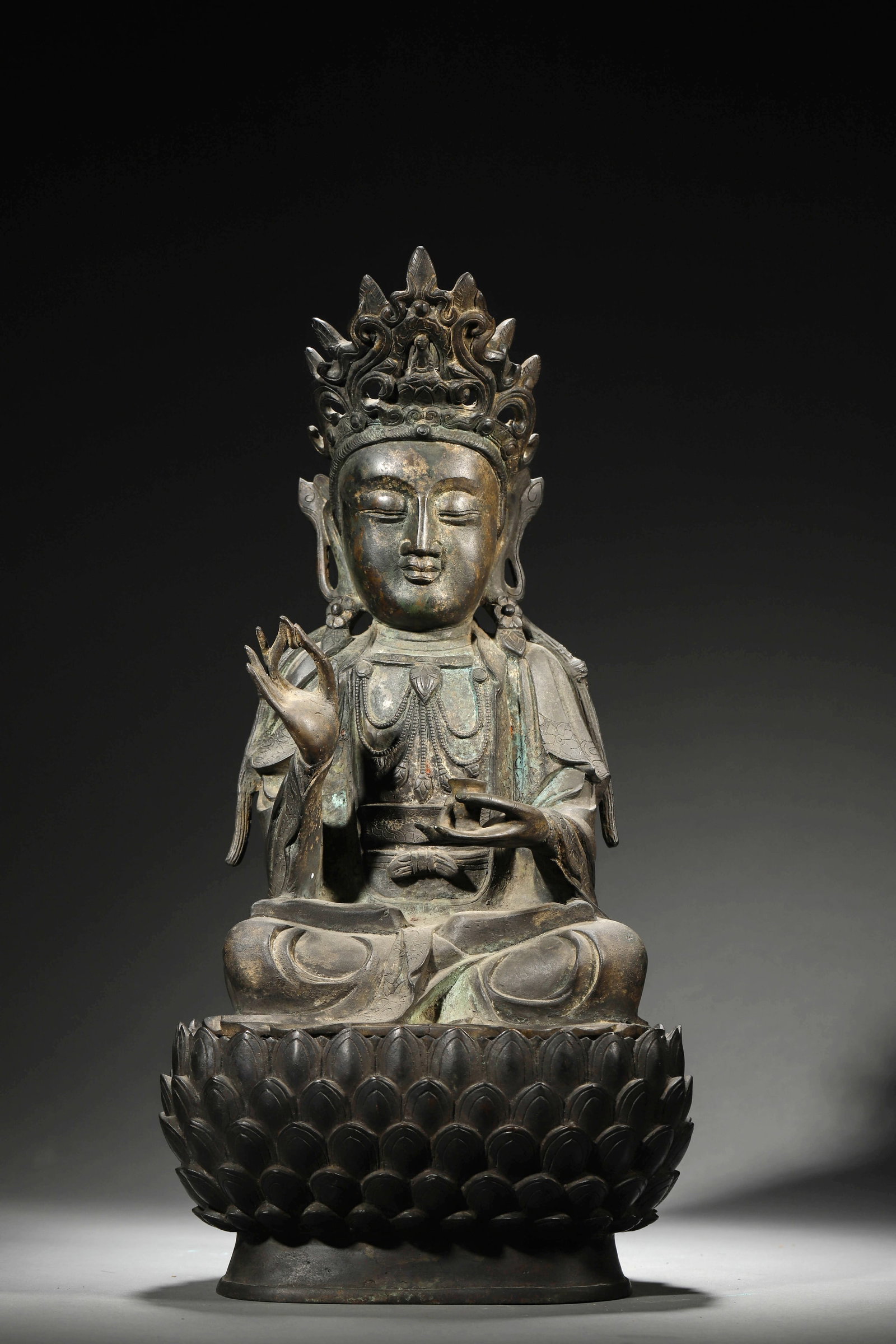A MING DYNASTY SHAKYAMUNI BUDDHA STATUE (1 of 11)