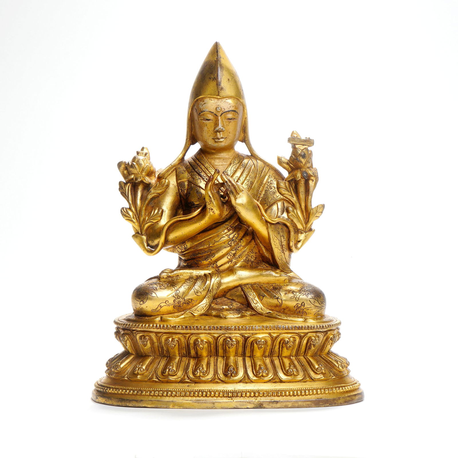 A QING DYNASTY GILT-BRONZE FIGURE OF TSONGKHAPA (1 of 7)