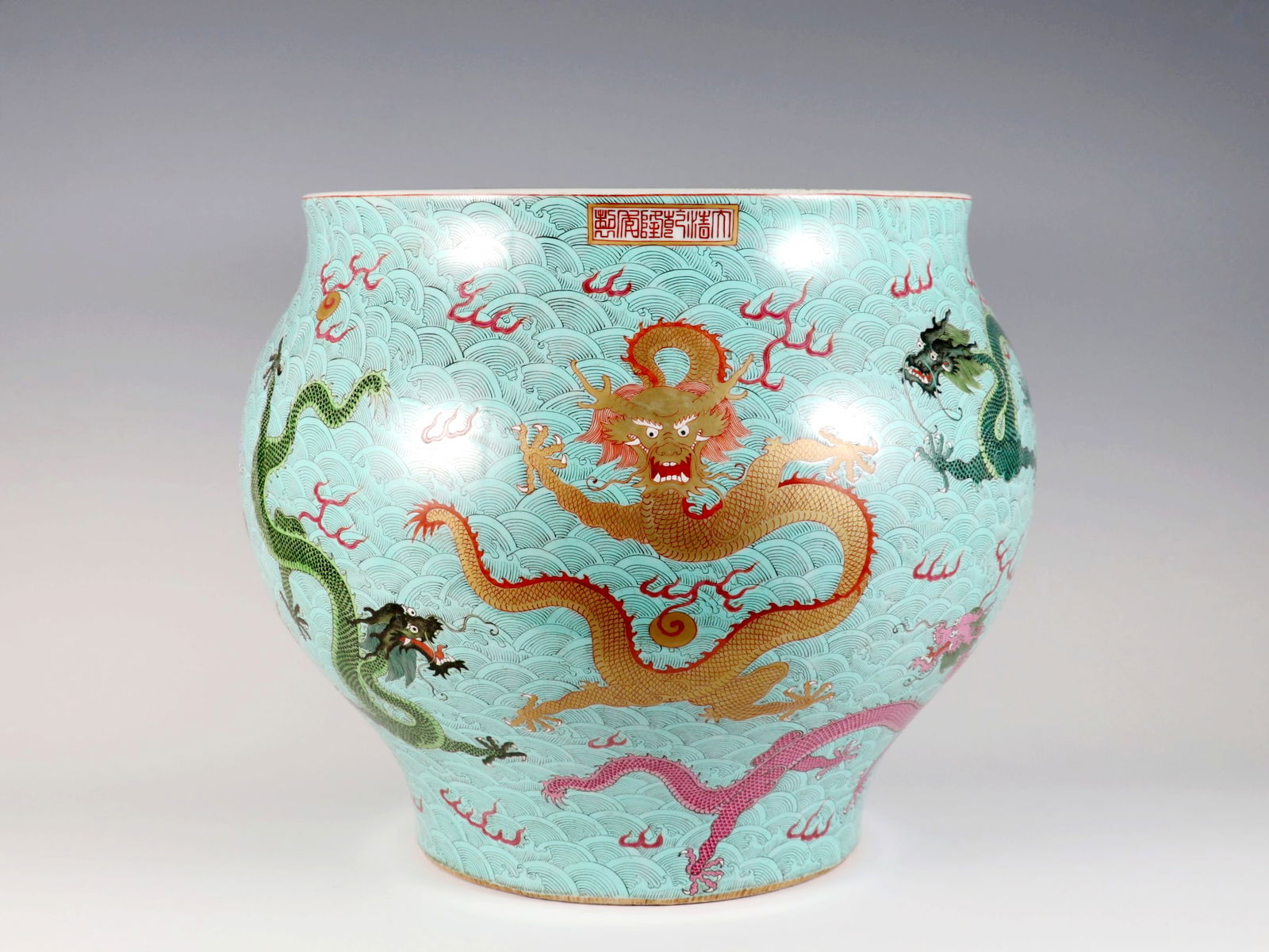 A FAMILLE ROSE 'NINE DRAGONS AMONG WAVES' LARGE JAR: A FAMILLE ROSE 'NINE DRAGONS AMONG WAVES' LARGE JAR H:36.5CM,D:42CM