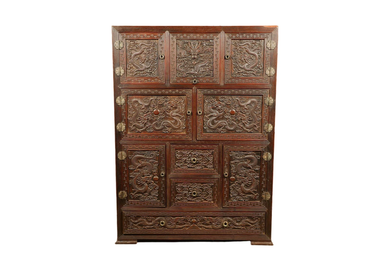 A HUANGHUALI DRAGON-CARVED MULTI-DRAWER CABINET (1 of 7)