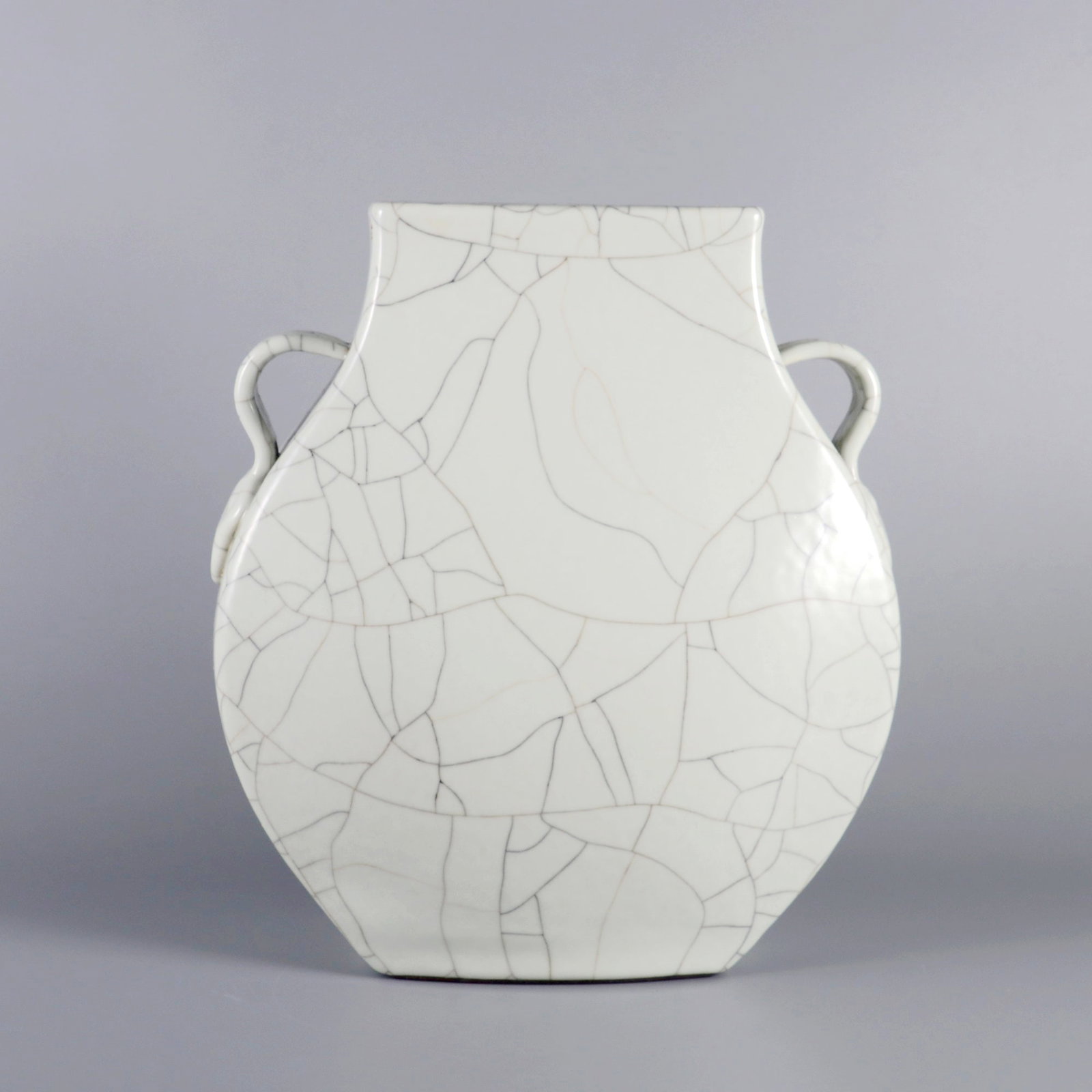 AN IMITATION GUAN-GLAZE 'RUYI'-HANDLE SQUARE VASE: AN IMITATION GUAN-GLAZE 'RUYI'-HANDLE SQUARE VASE H:29.8CM,D:26CM