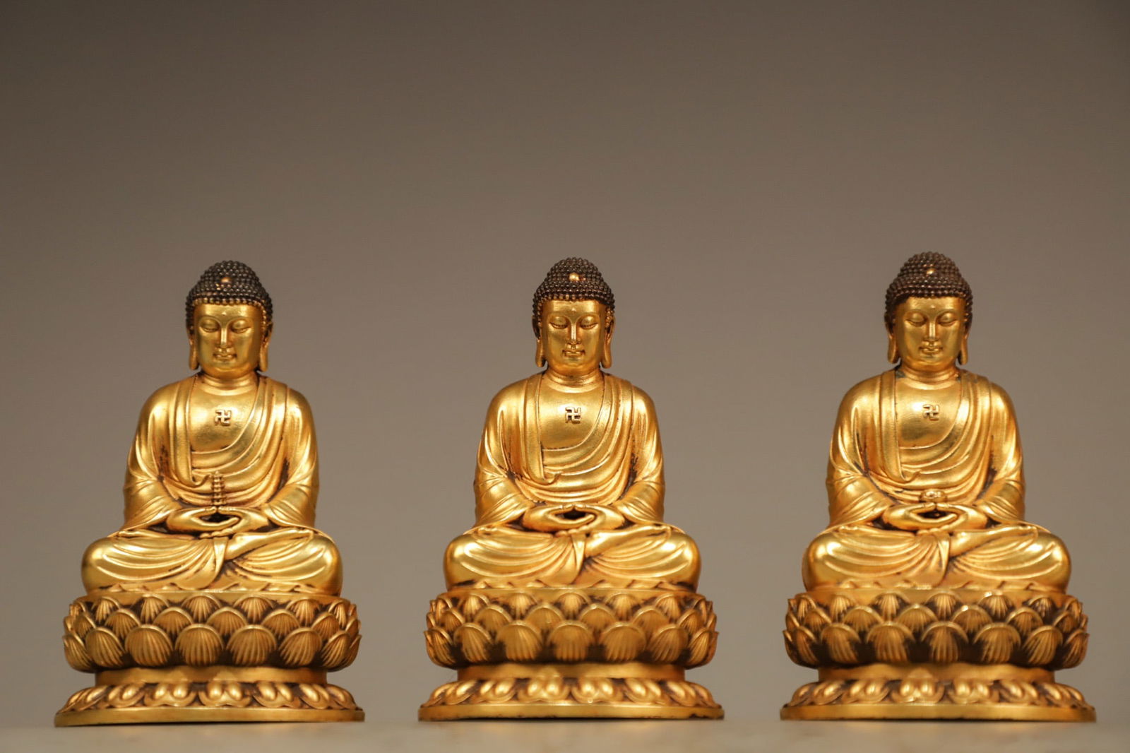 Group of Three Gilt Bronze Sakyamuni Figure: Group of Three Gilt Bronze Sakyamuni Figure (9.5 x 5.5 x 5cm)