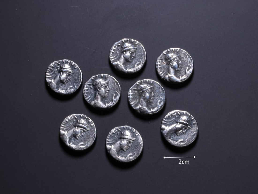 Group of Eight Silver Carved Character Pattern Coin: Group of Eight Silver Carved Character Pattern Coin (2cm)