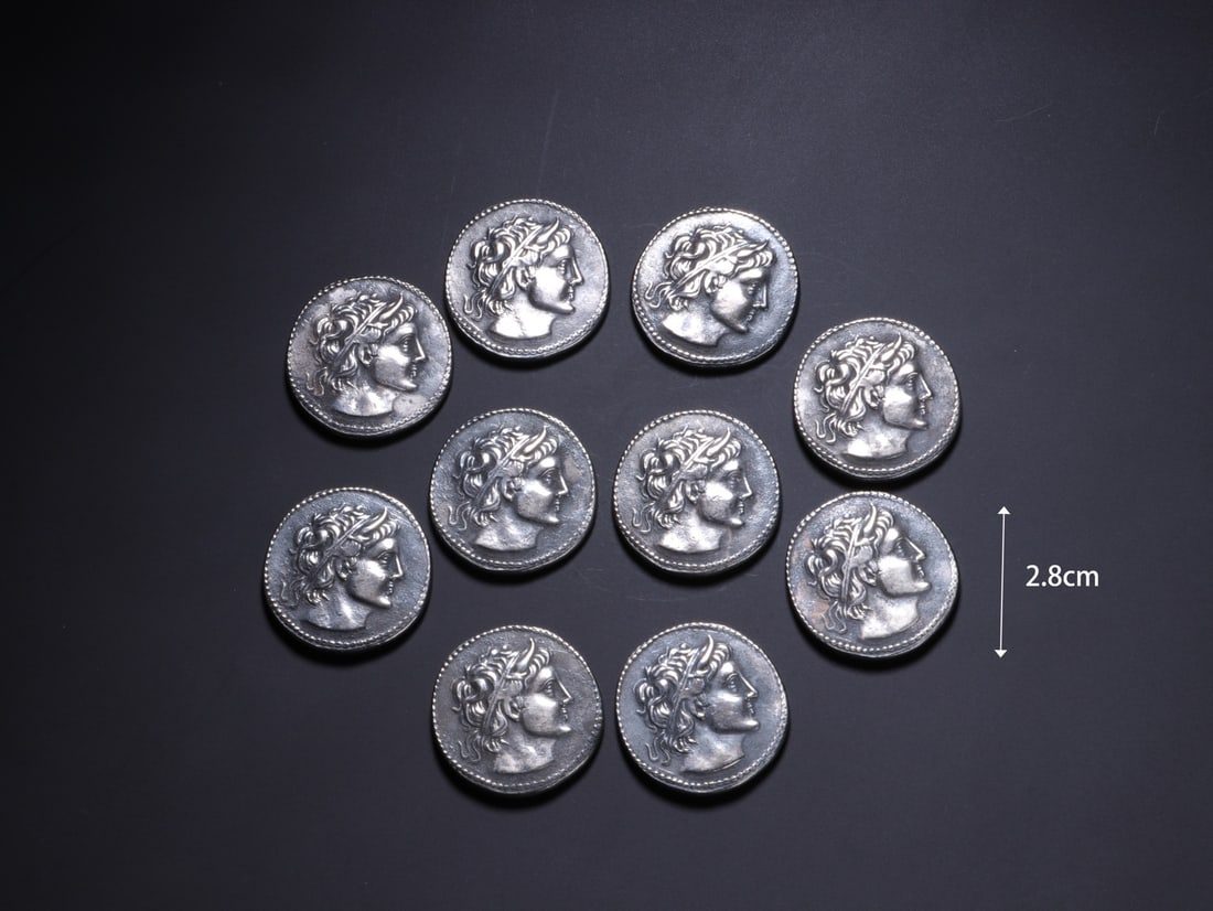 Group of Ten Silver Carved Character Pattern Coin: Group of Ten Silver Carved Character Pattern Coin (2.8cm)