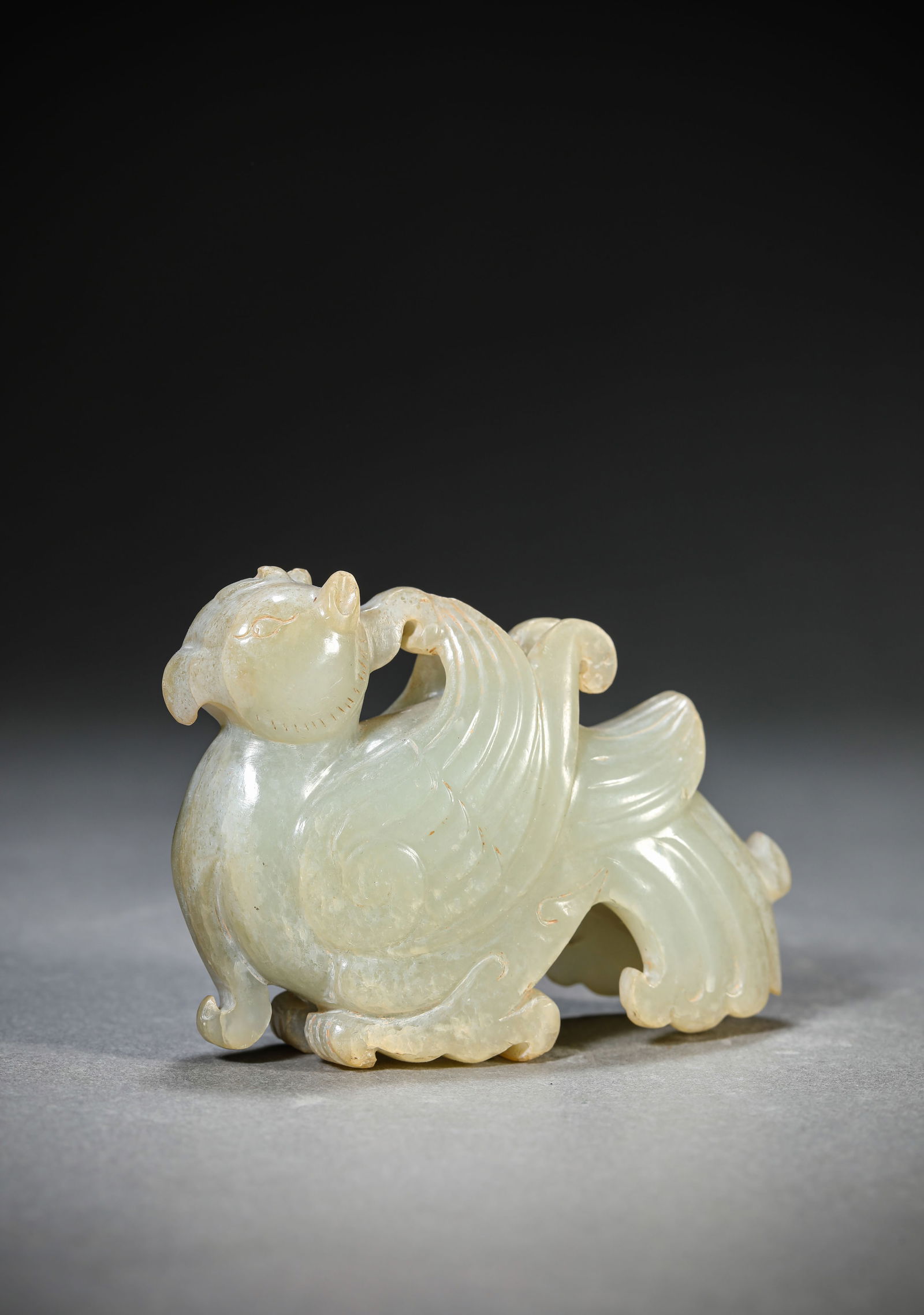 A Jade 'Phoenix' Bird: A Jade 'Phoenix' Bird (8 x 2.5 x 5.7 cm)