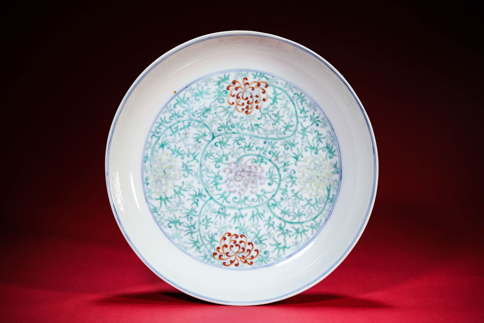 A Doucai 'Interlocking Chrysanthemum' Dish: A Doucai 'Interlocking Chrysanthemum' Dish (22.6 x 4.3 cm)