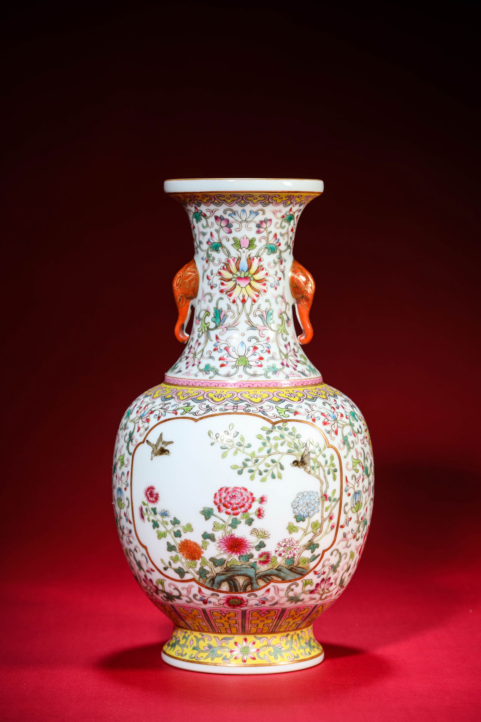 A Famille-Rose 'Interlocking Lotus' 'Magpie on Plum Branch Reserves' Vase: A Famille-Rose 'Interlocking Lotus' 'Magpie on Plum Branch Reserves' Vase (16.3 x 30.4 cm)