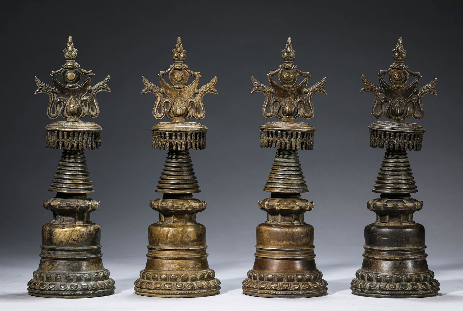 A Group of 'Tibetan Kadam-Style' Alloy Bronze Stupas: A Group of 'Tibetan Kadam-Style' Alloy Bronze Stupas (10.5 x 30.3 cm, Weight: 5.1 Kg)