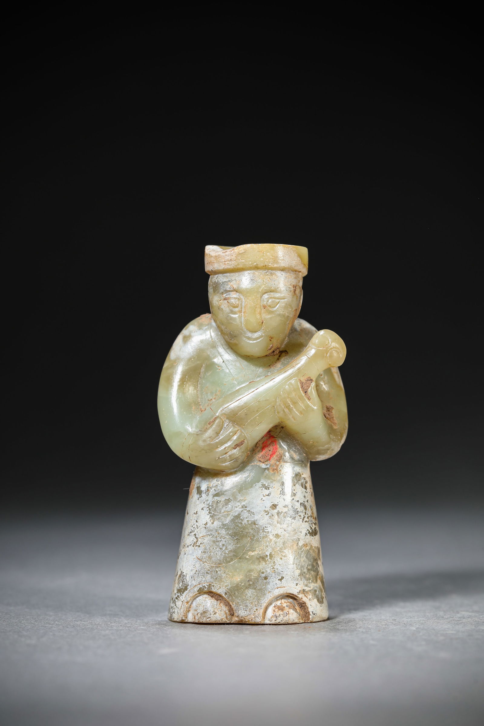 A Jade Figure: A Jade Figure (4.1 x 2.8 x 7.9 cm)