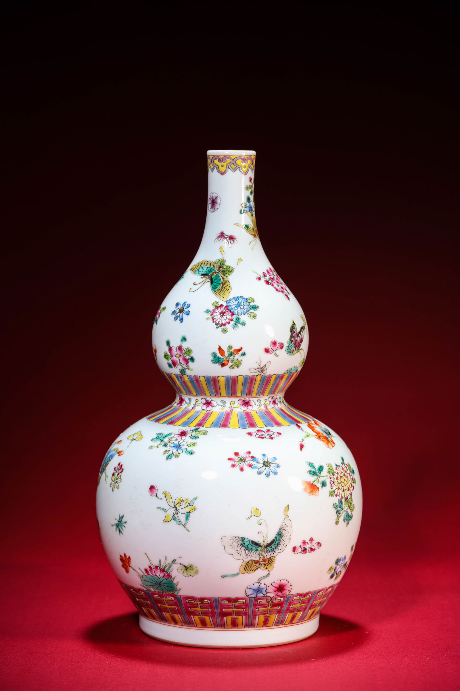 A Famille-Rose 'Butterflies Among Flowers' Vase: A Famille-Rose 'Butterflies Among Flowers' Vase (13.8 x 25.7 cm)