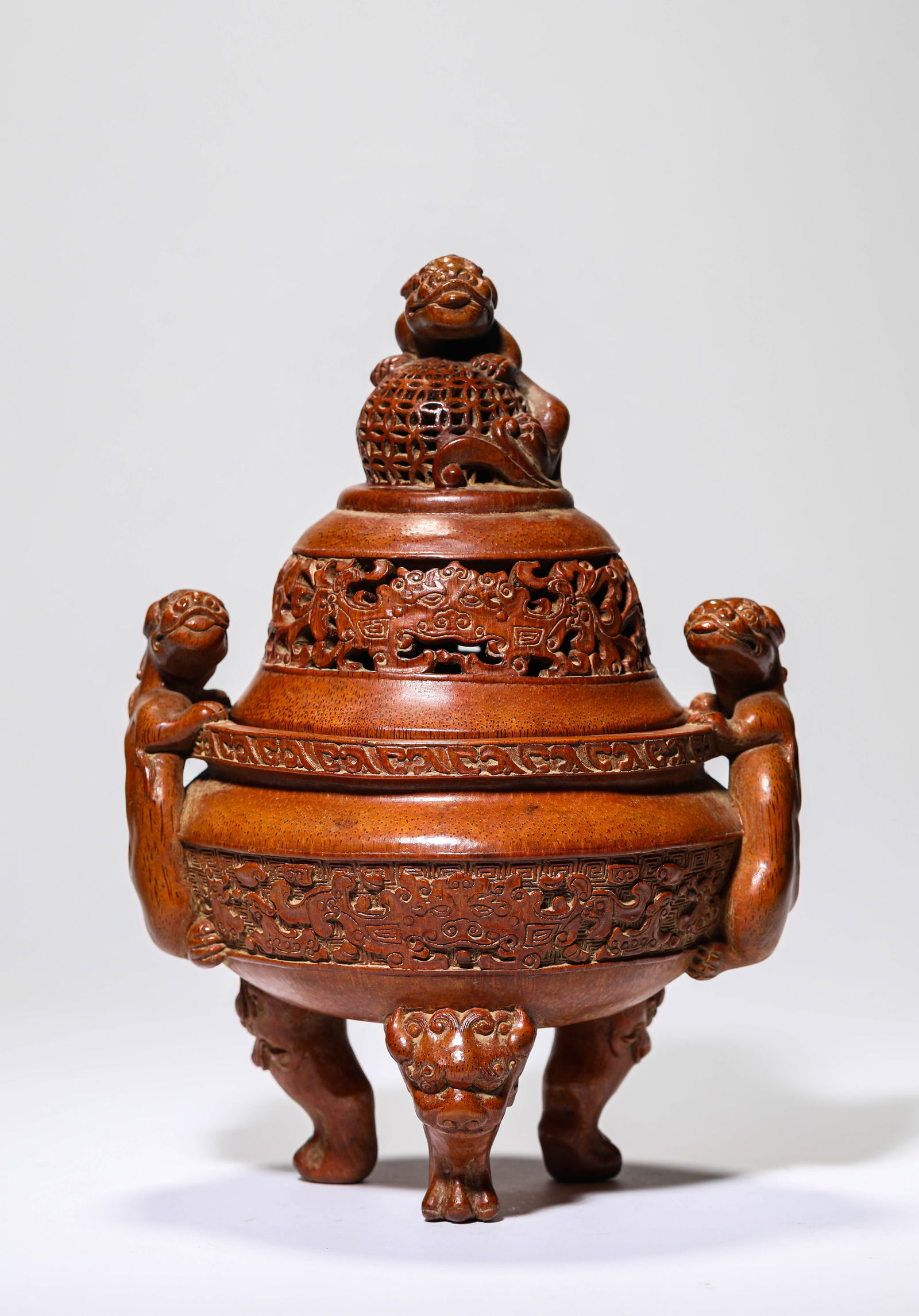 A Bamboo 'Carved Taotie and Chi-Dragon Handles' Censer: A Bamboo 'Carved Taotie and Chi-Dragon Handles' Censer (18.3 x 14.6 x 25.5 cm)