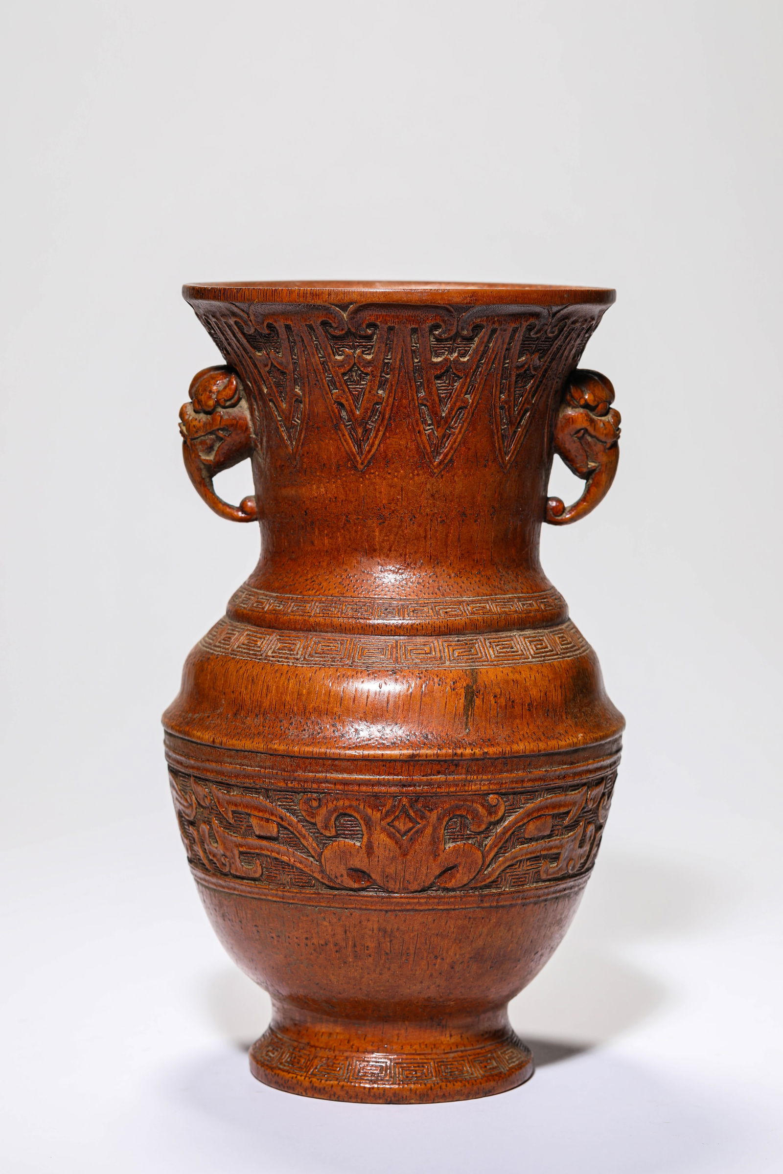 A Bamboo 'Carved Beast-Head Handles' Vase: A Bamboo 'Carved Beast-Head Handles' Vase (14.5 x 24.8 cm)