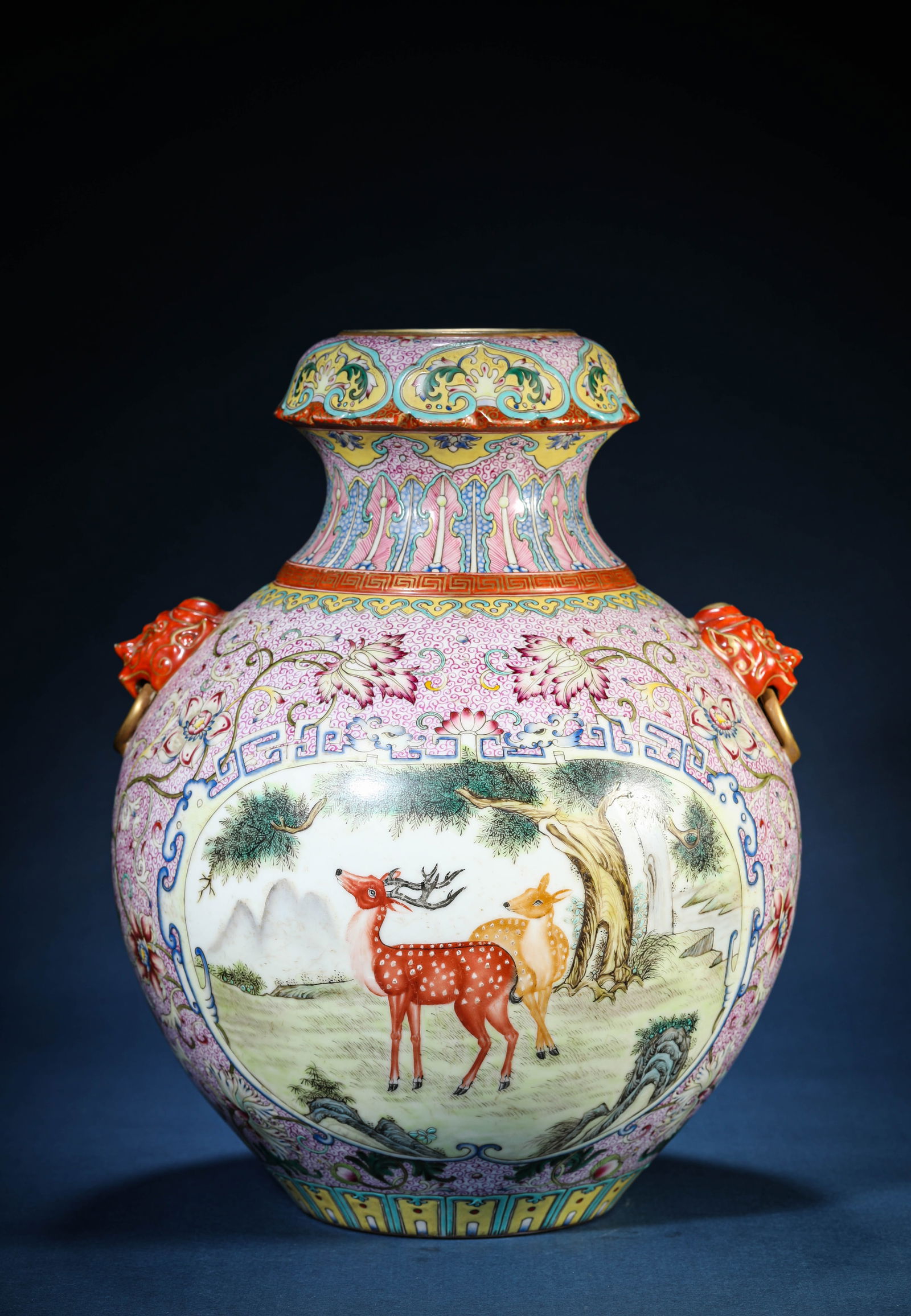 A Famille-Rose 'Floral and Auspicious Beast Reserves' Zun: A Famille-Rose 'Floral and Auspicious Beast Reserves' Zun (27.8 x 35.5 cm)