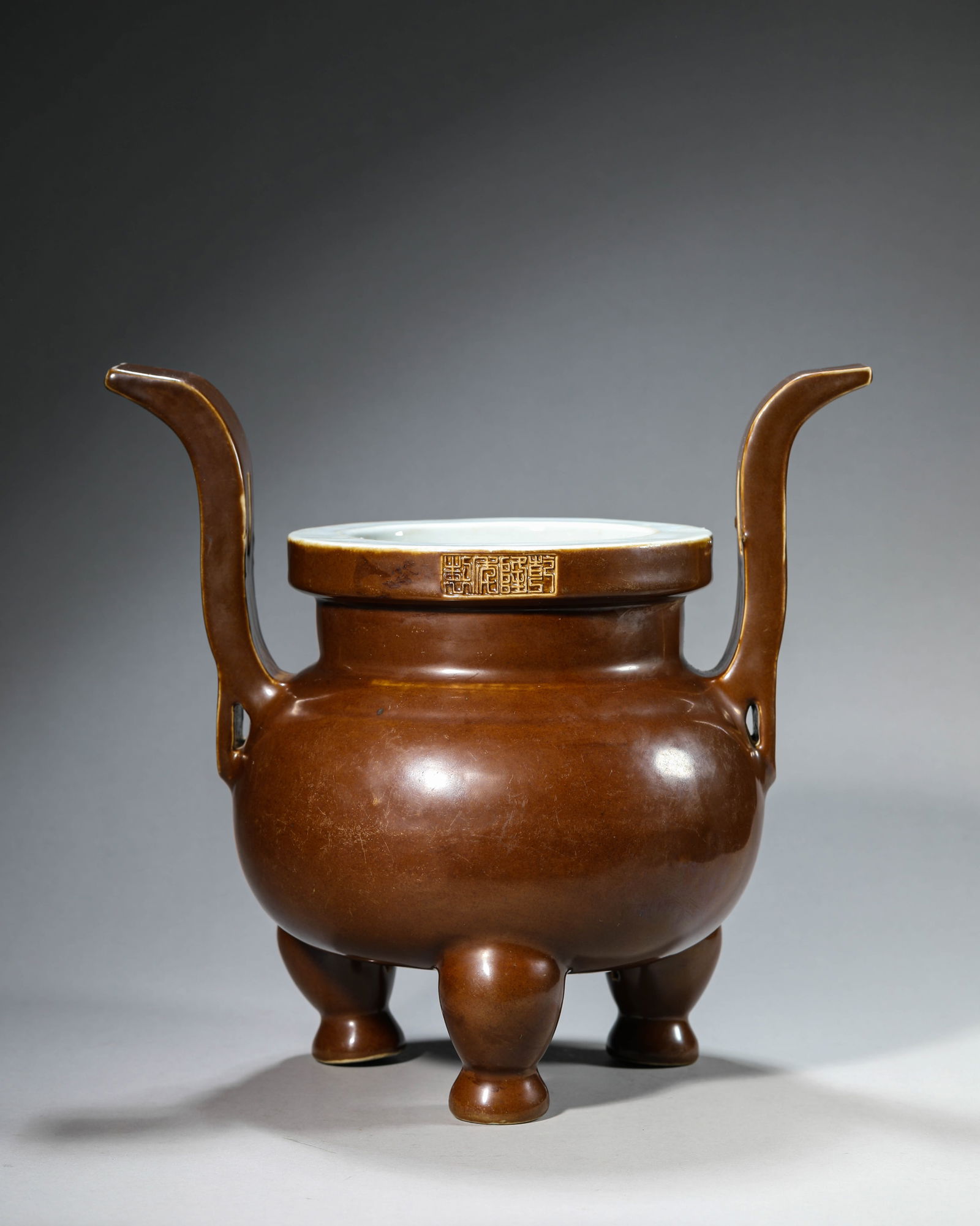 A Soy-Brown-Glazed ‘Court Hat Handles’ Censer: A Soy-Brown-Glazed ‘Court Hat Handles’ Censer (30.5 x 20 x 29 cm)