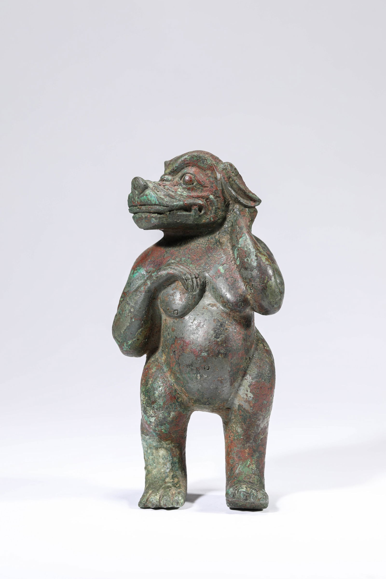 A Bronze 'Auspicious Beast' Ornament: A Bronze 'Auspicious Beast' Ornament (7.5 x 5.1 x 15.1 cm, Weight: 530 grams)