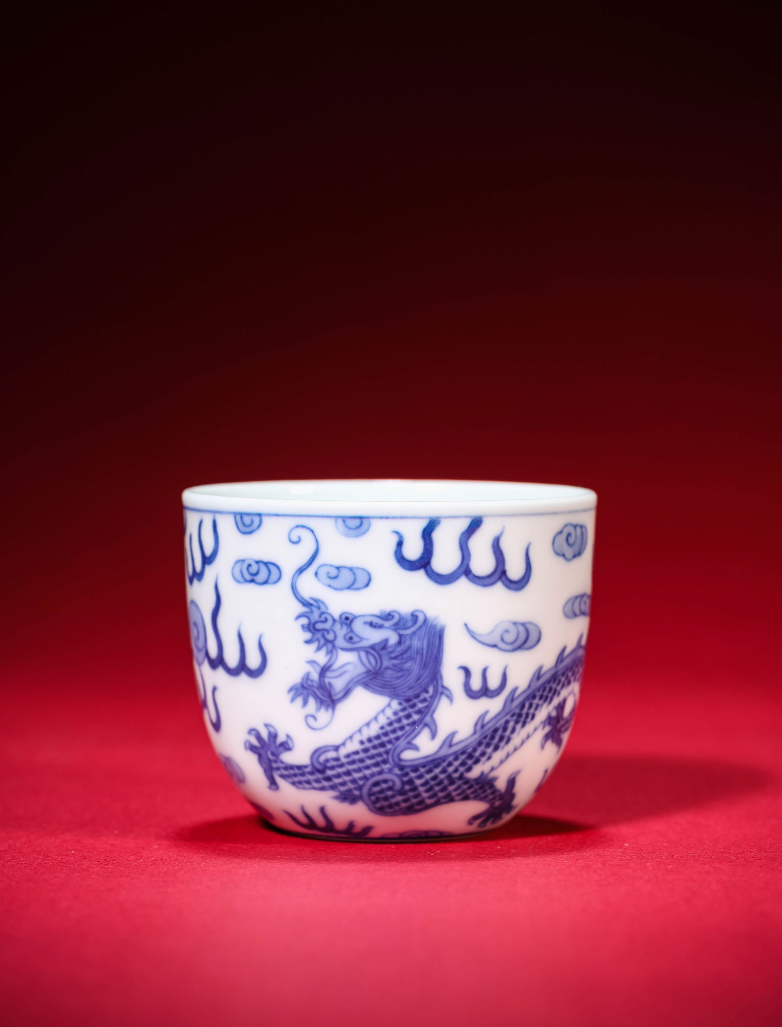 A Blue and White 'Dragon Chasing a Pearl' Cup: A Blue and White 'Dragon Chasing a Pearl' Cup (6.1 x 5.1 cm)