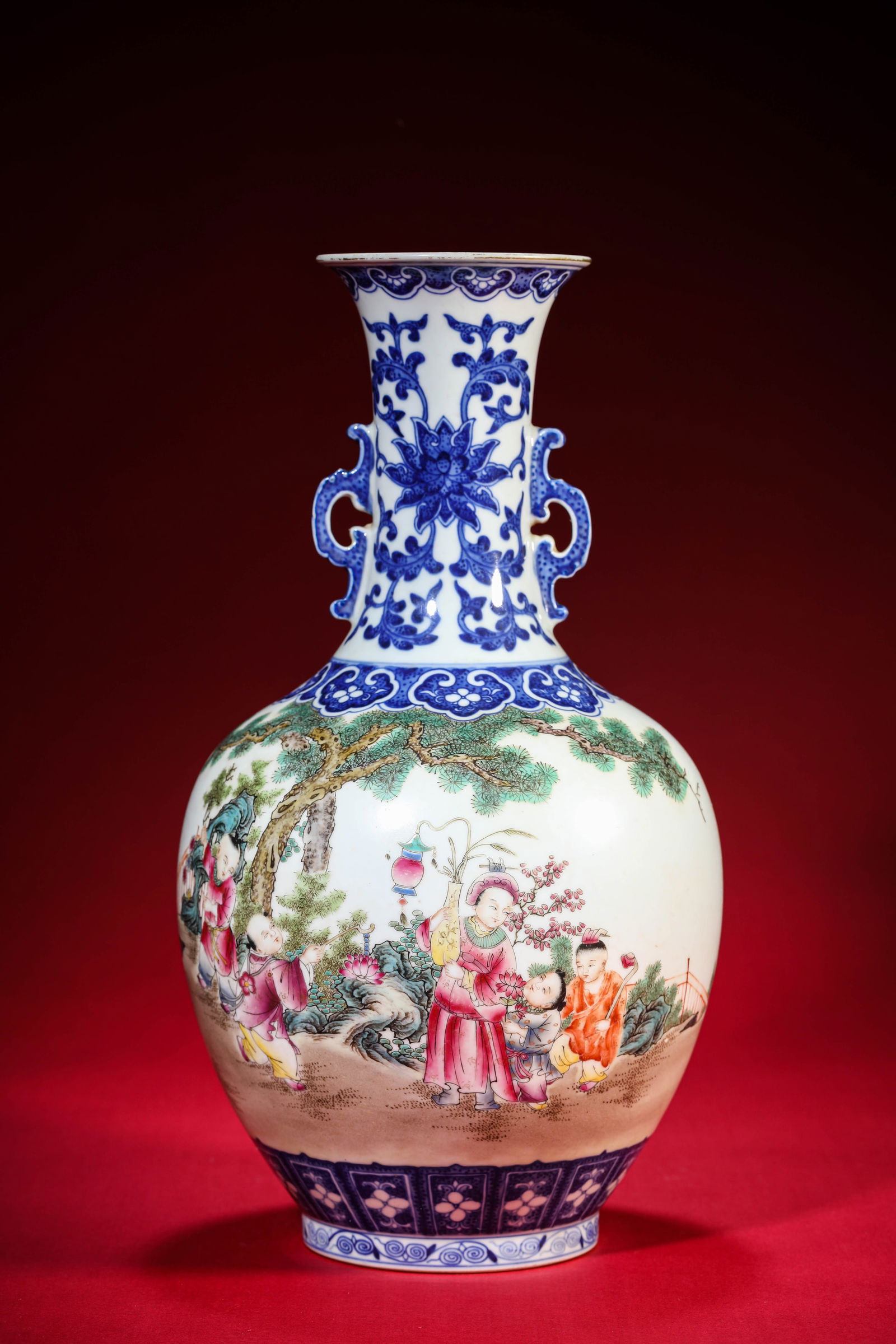A Blue and White and Famille-Rose 'Children at Play' Vase: A Blue and White and Famille-Rose 'Children at Play' Vase (18.2 x 33.4 cm)