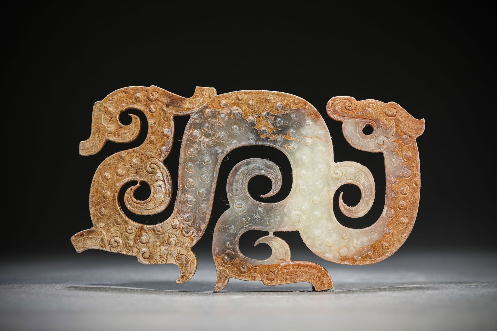 A Jade 'Dragon' Pendant: A Jade 'Dragon' Pendant (11.9 x 7.2 cm)