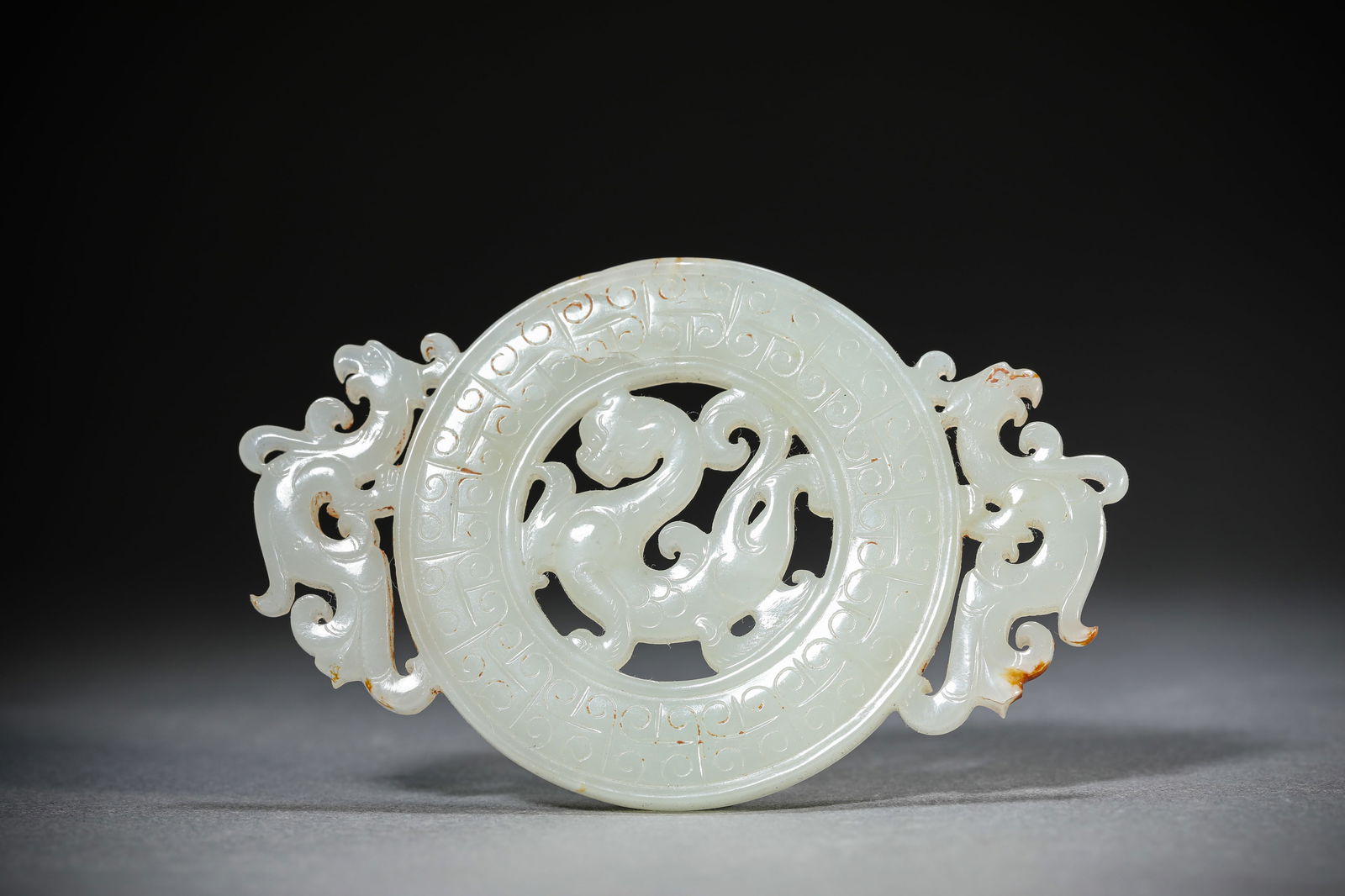 A Jade Bi Disc: A Jade Bi Disc (9.3 x 5.9 cm)