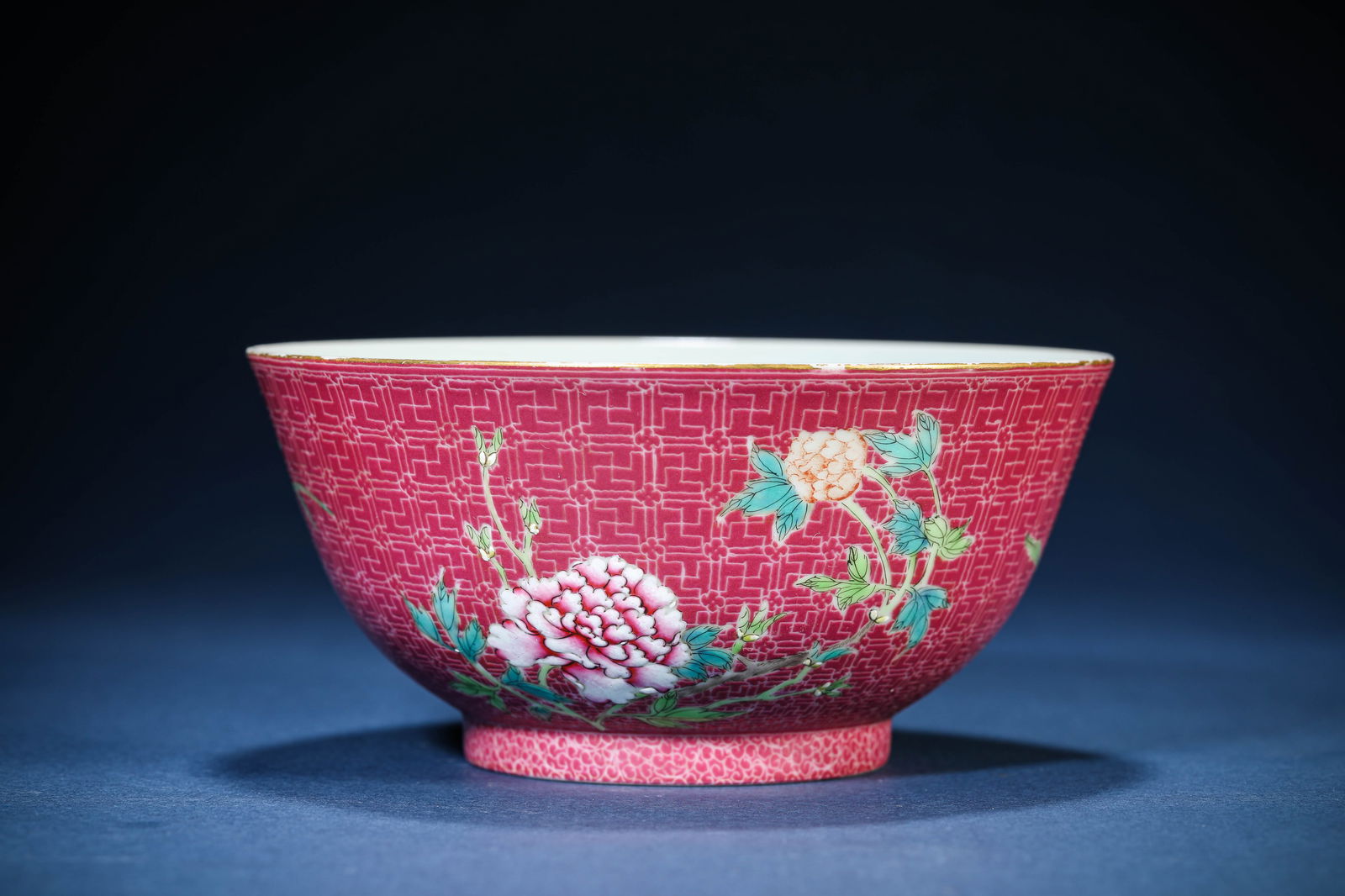 A Rouge-Ground Famille-Rose 'Floral' Bowl: A Rouge-Ground Famille-Rose 'Floral' Bowl (14.7 x 7 cm)