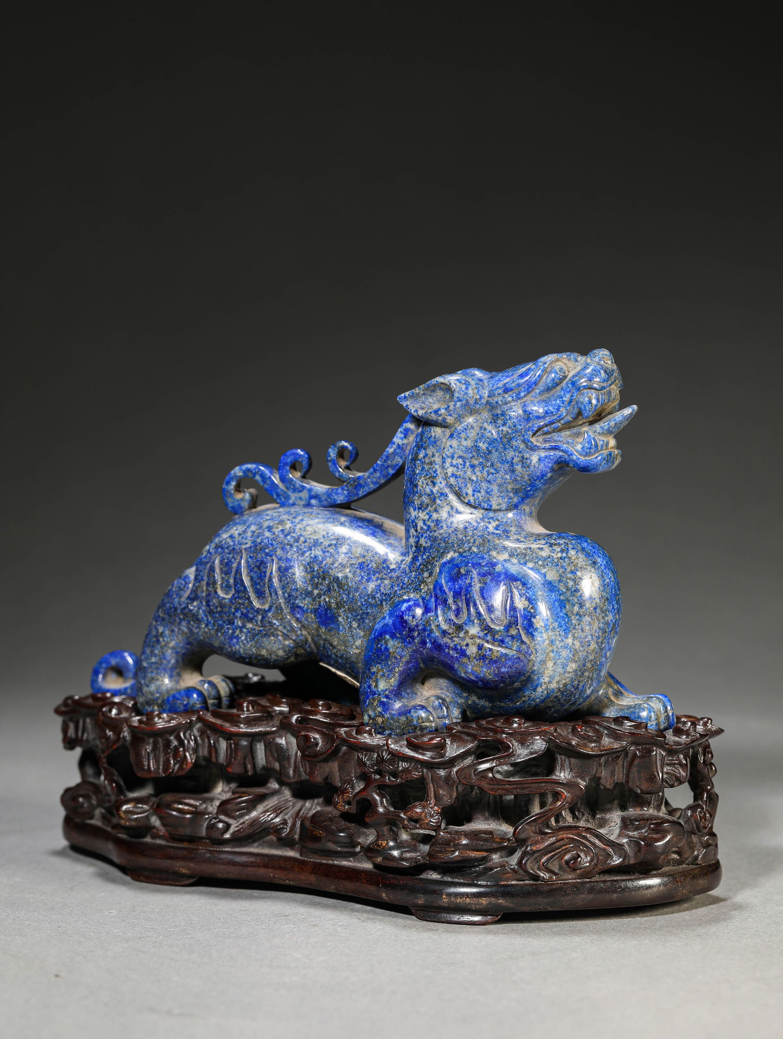 A Lapis Lazuli 'Auspicious Beast': A Lapis Lazuli 'Auspicious Beast' (16.1 x 5 x 9.7 cm)