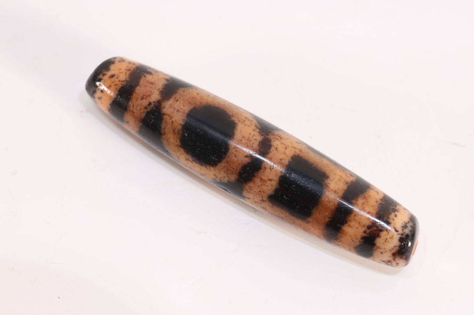 Dzi Bead: Dzi Bead (7 x 1.5cm)