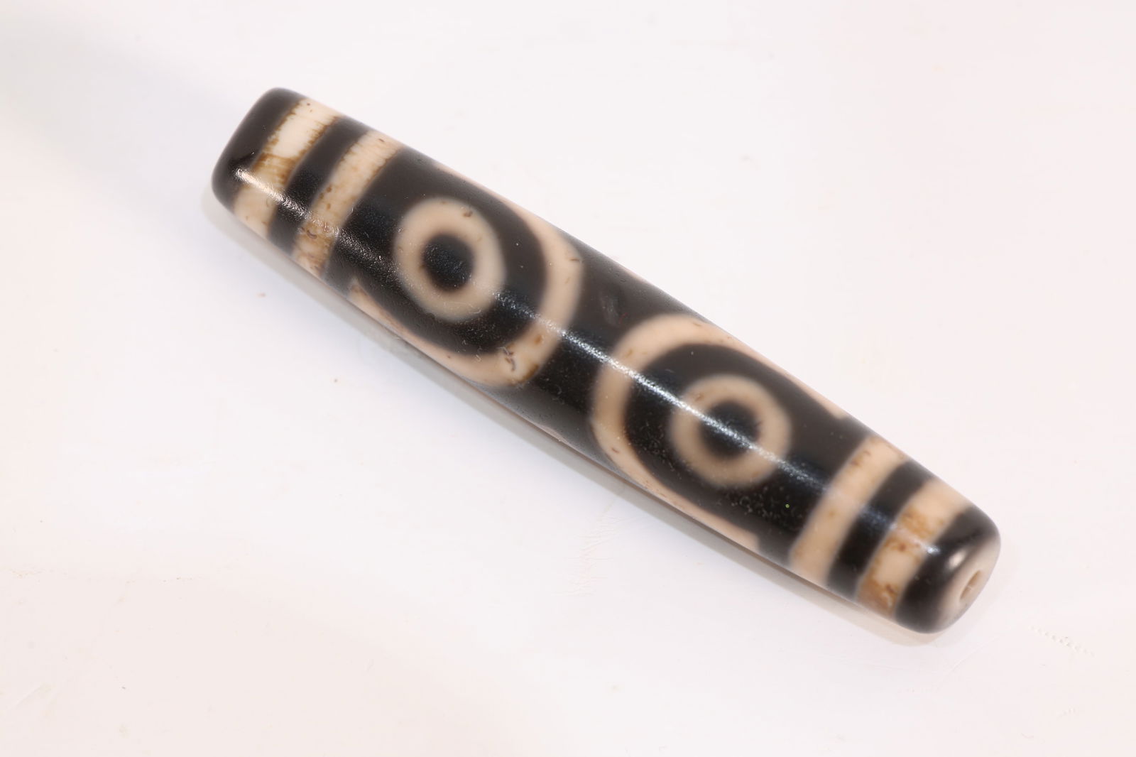 Dzi Bead: Dzi Bead (7 x 1.3cm)