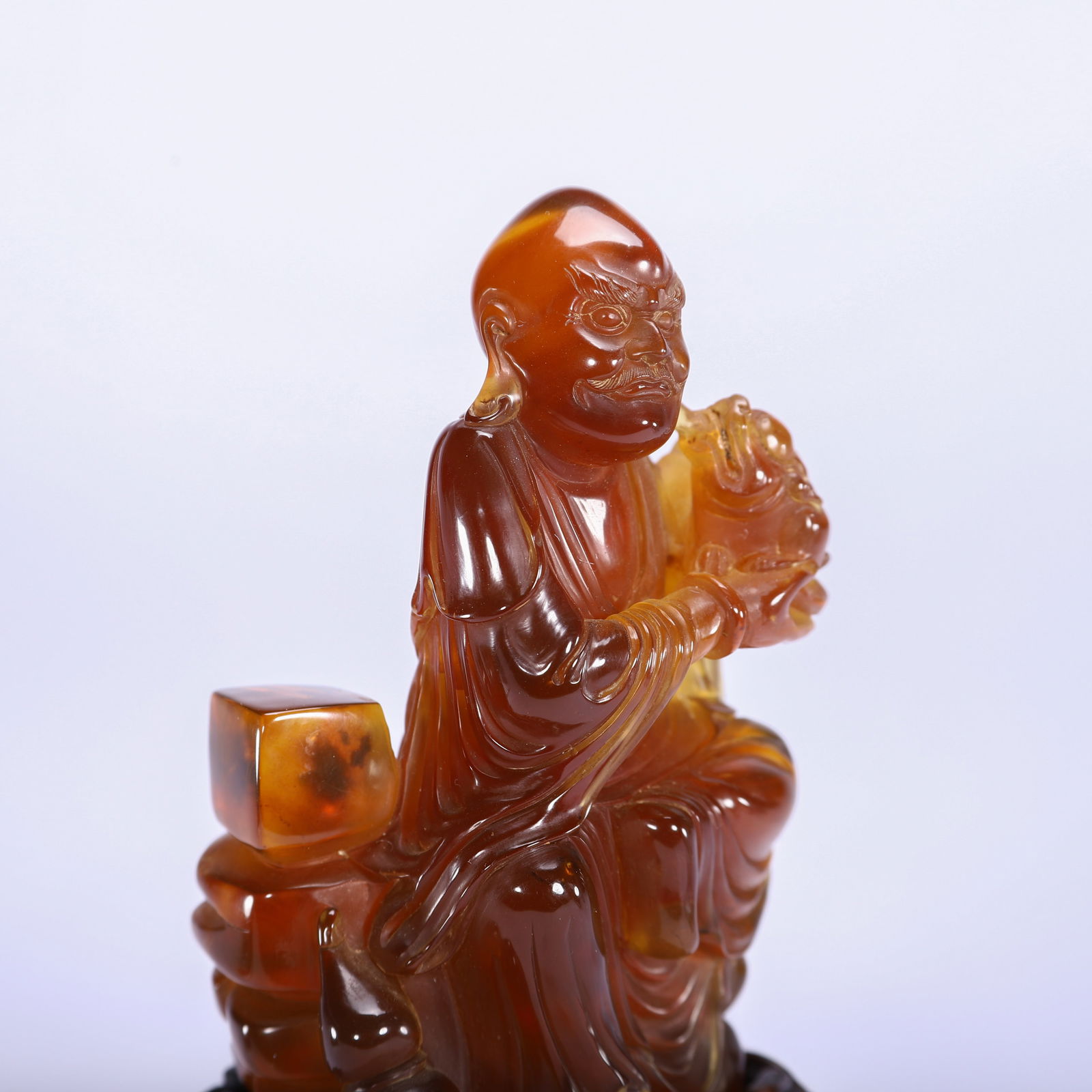 A CHINESE AMBER LUOHAN FIGURE - 5