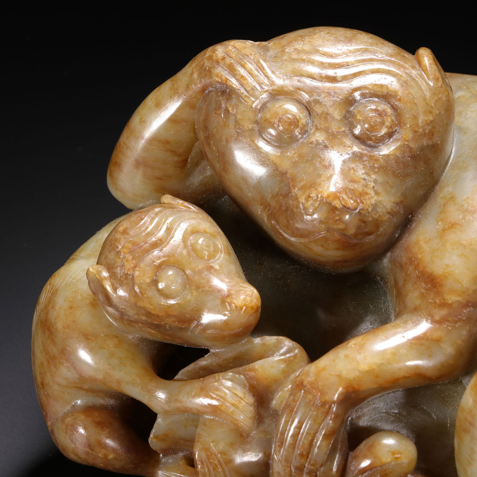 A CHINESE JADE MONKEY GROUP - 2