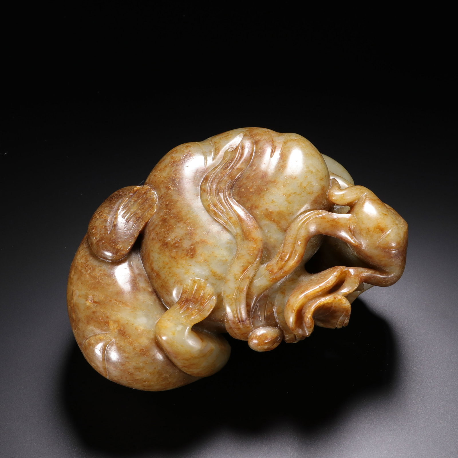 A CHINESE JADE MONKEY GROUP - 9