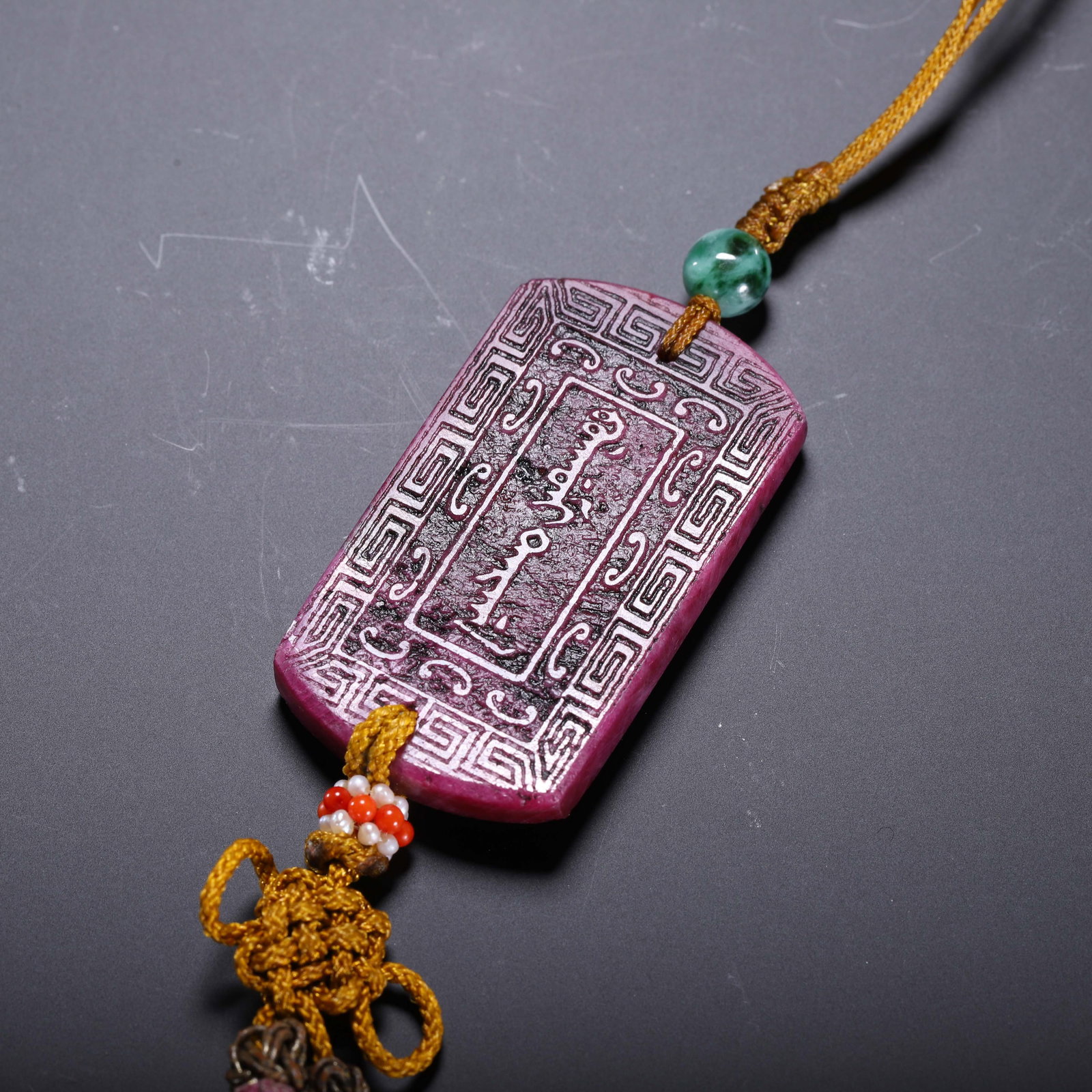 A CHINESE RUBY 'ZHAI JIE' PENDANT - 6