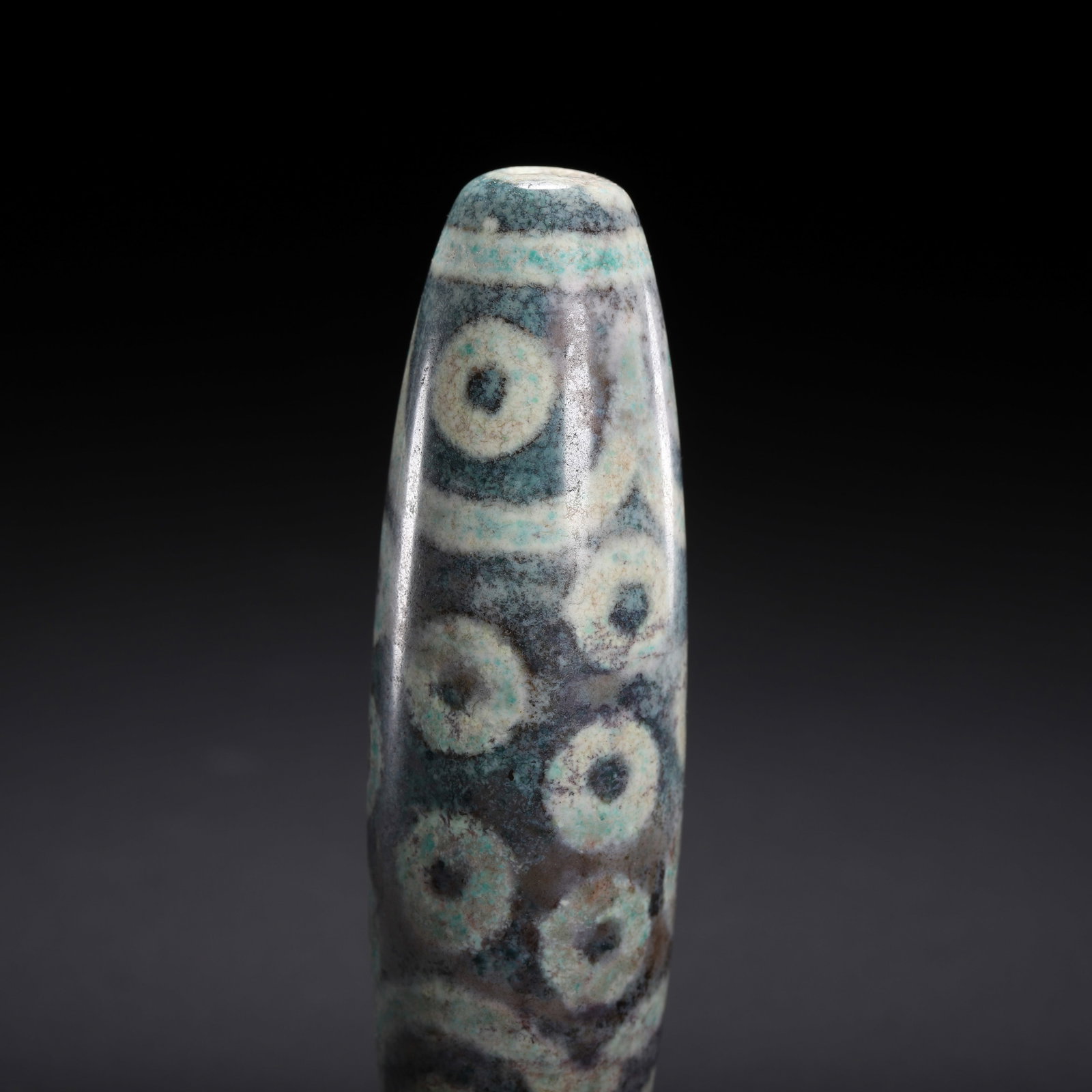 A CHINESE MULTI-EYED DZI BEAD - 4