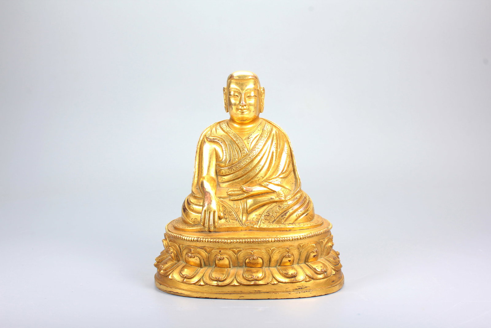 A GILT BRONZE FIGURE OF GURU: A GILT BRONZE FIGURE OF GURU H:13CM,W:11.5CM