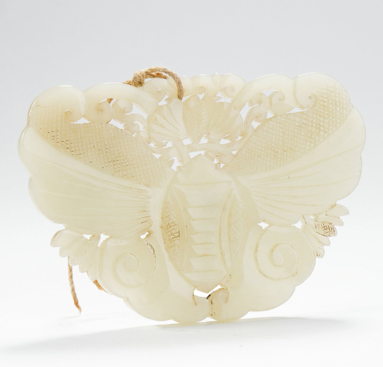 A HETIAN WHITE JADE OPENWORK BUTTERFLY PENDANT: A HETIAN WHITE JADE OPENWORK BUTTERFLY PENDANT L:9.7CM,W:6.5CM