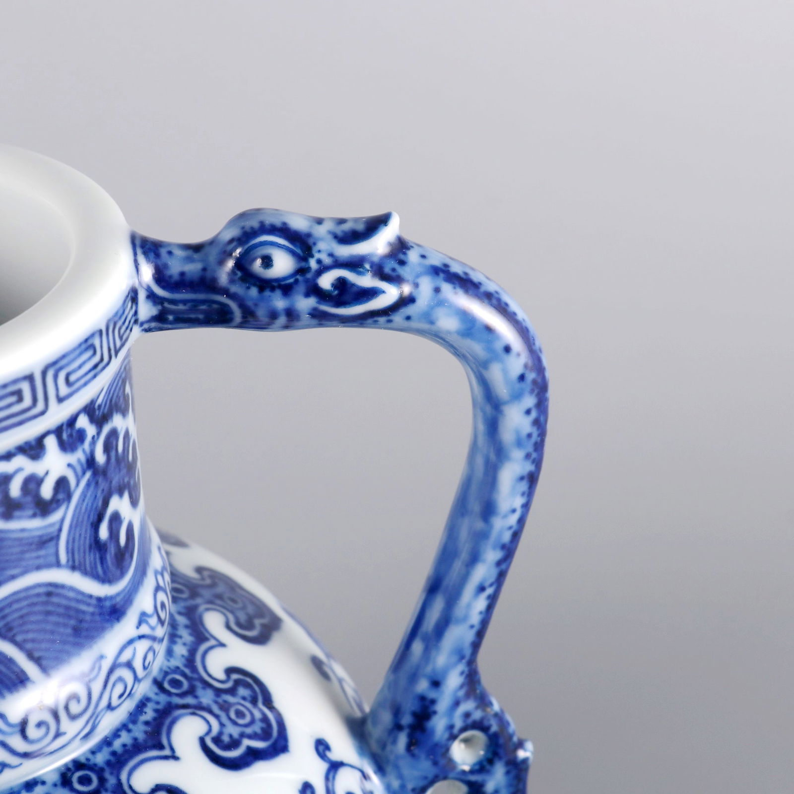 A BLUE AND WHITE WATER PITCHER WITH INTERLOCKING LOTUS PATTERN - 7