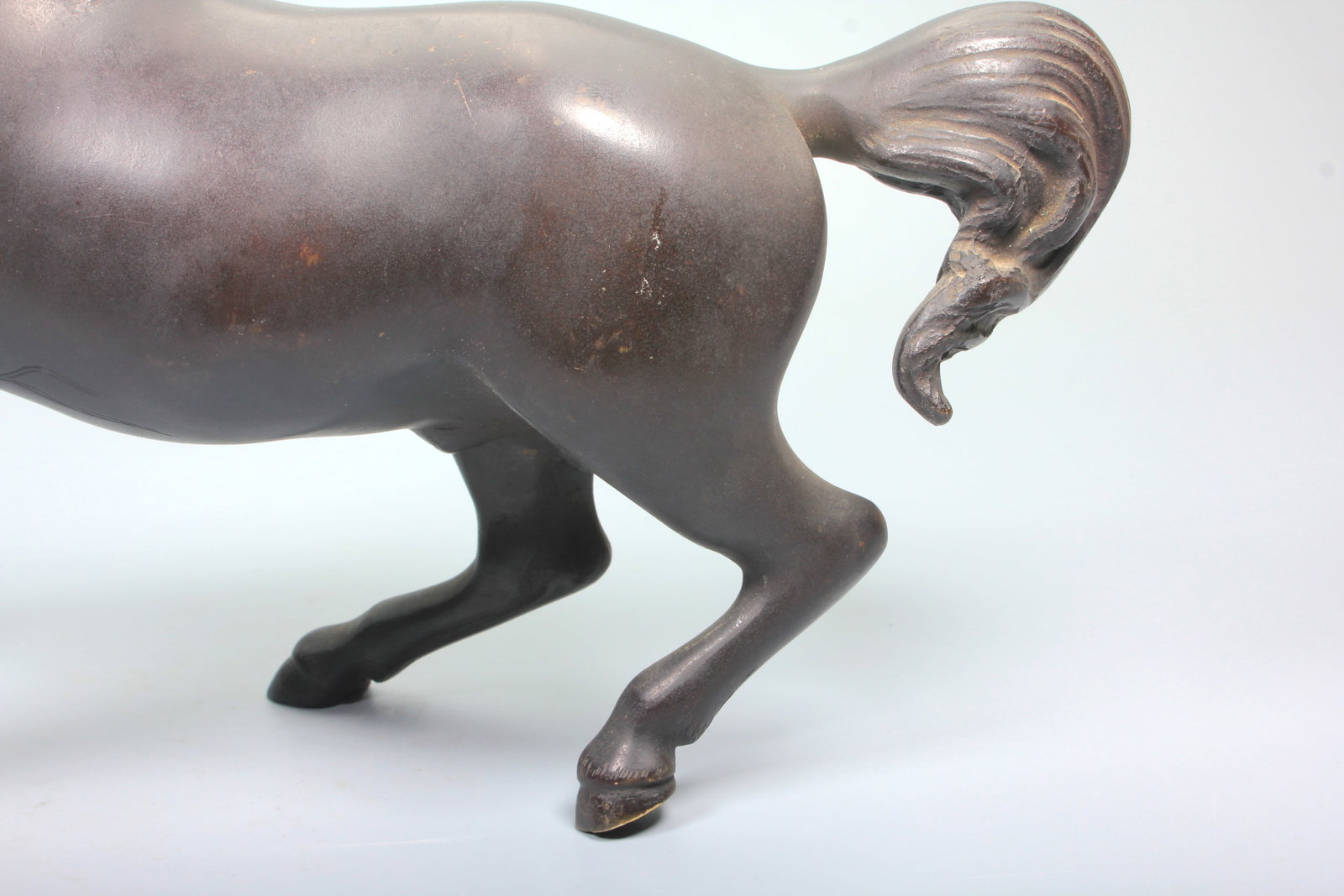 A BRONZE GALLOPING HORSE - 4