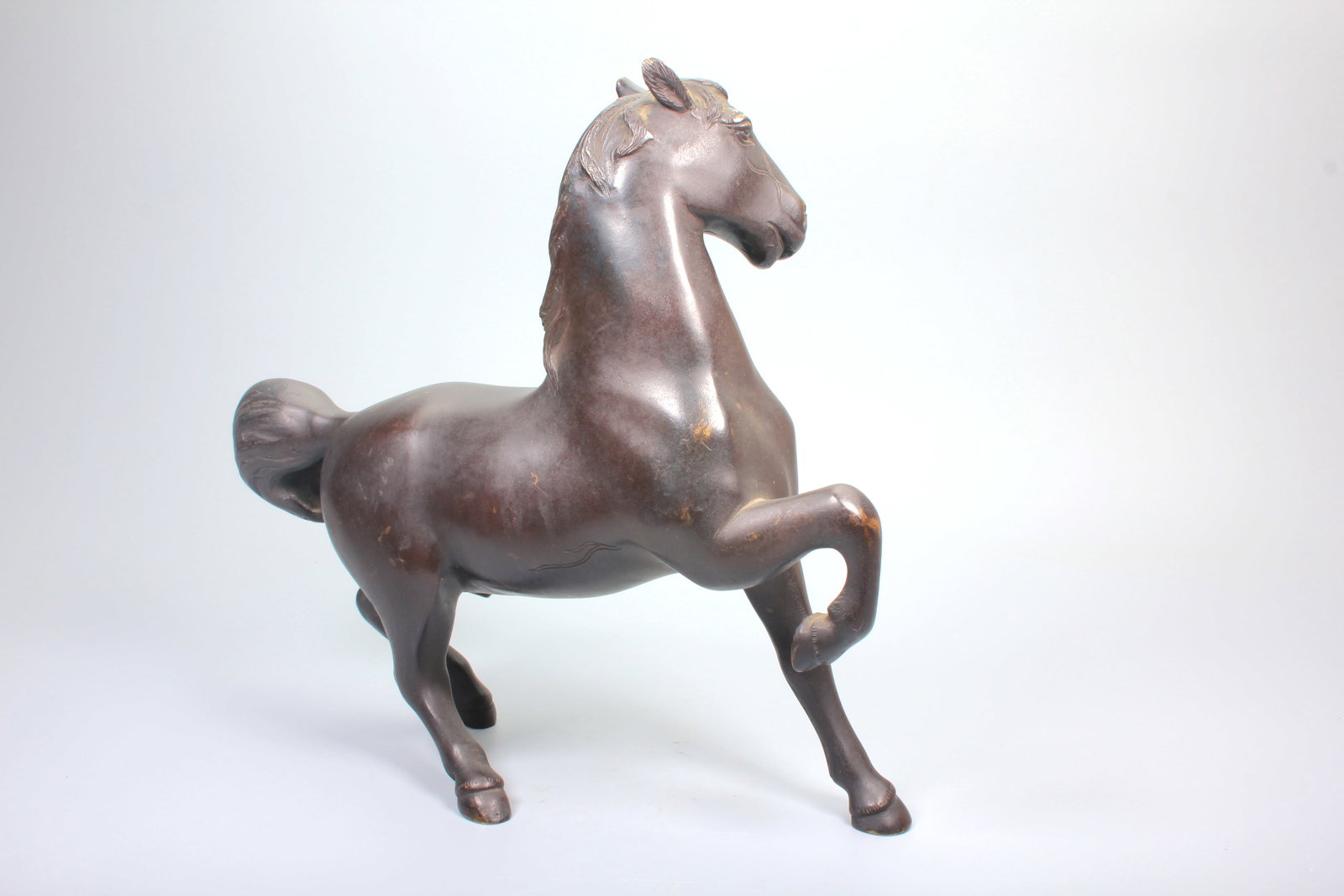A BRONZE GALLOPING HORSE - 6